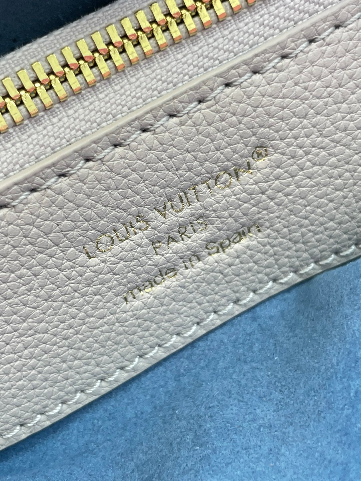 LOUIS VUITTON FLORE 28 IN WHITE PERFORATED CALFSKIN