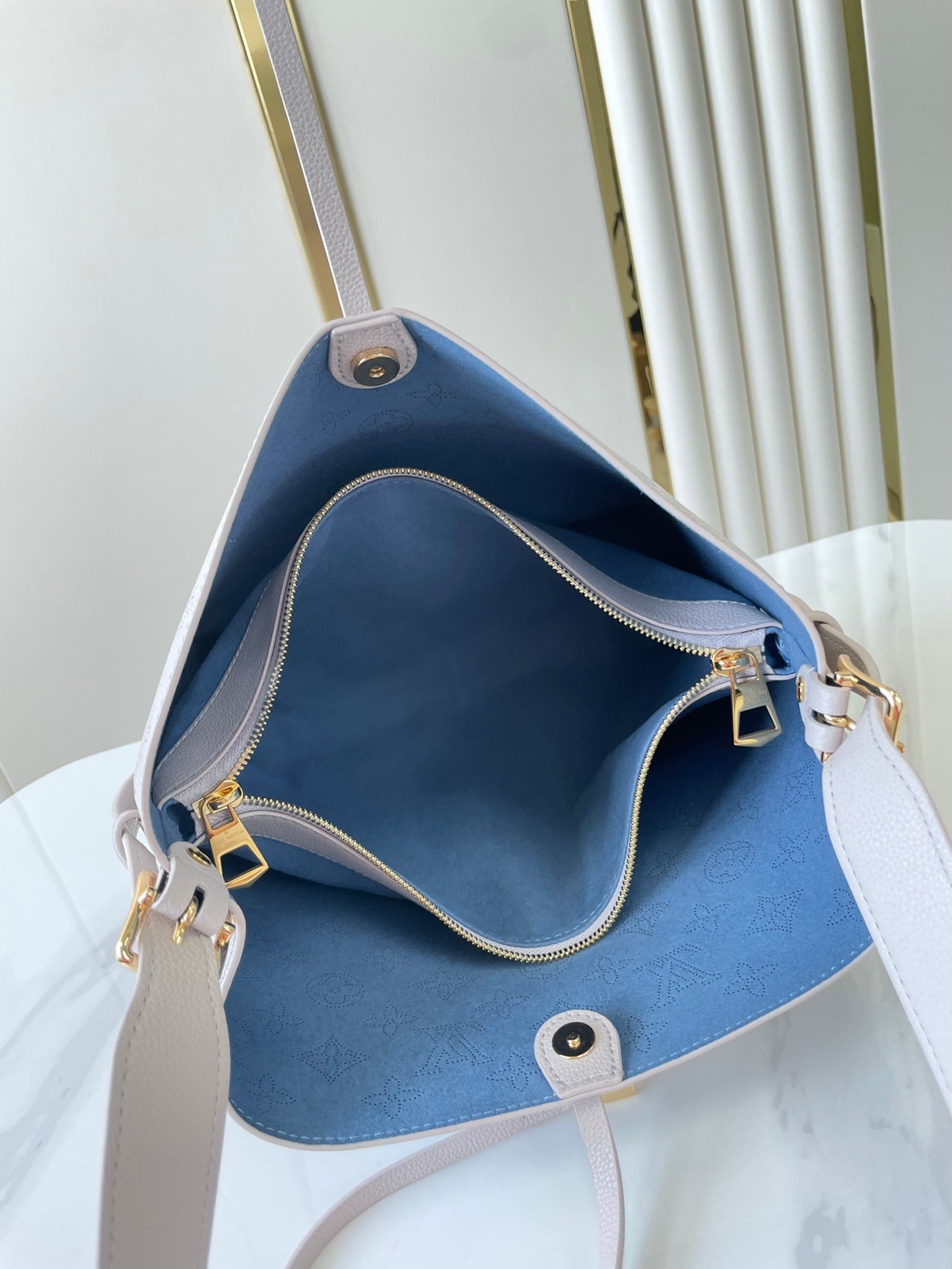LOUIS VUITTON FLORE 28 IN WHITE PERFORATED CALFSKIN