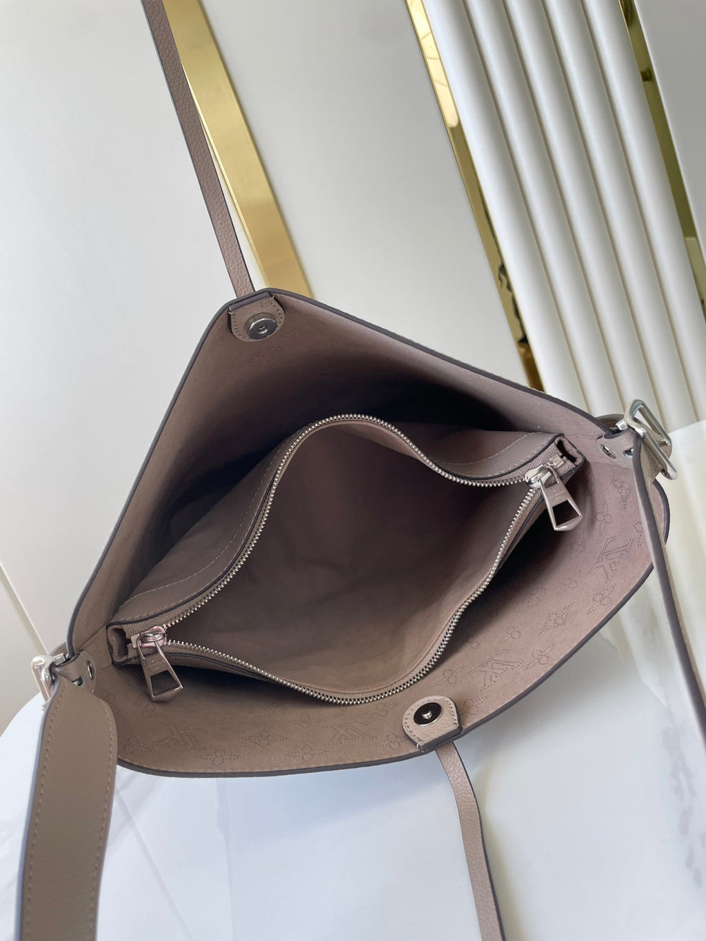 LOUIS VUITTON FLORE 28 IN GALET PERFORATED CALFSKIN