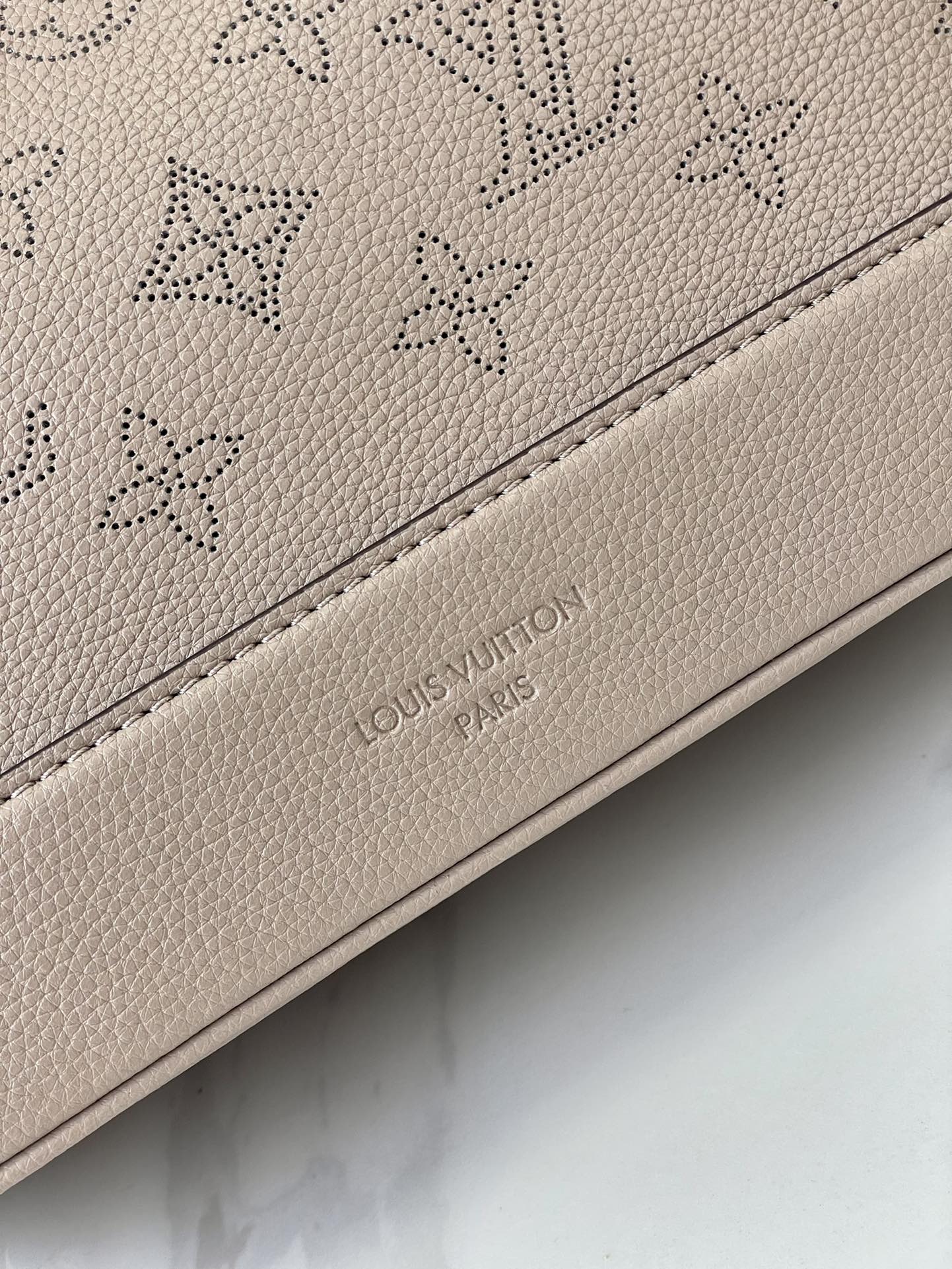 LOUIS VUITTON FLORE 28 IN GALET PERFORATED CALFSKIN