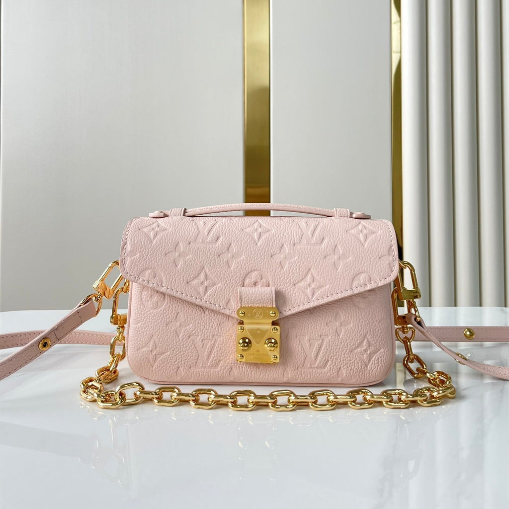 LOUIS VUITTON POCHETTE MÉTIS EAST WEST 21 IN PINK OPALE MONOGRAM ECLIPSE CANVAS GOLD BUCKLE