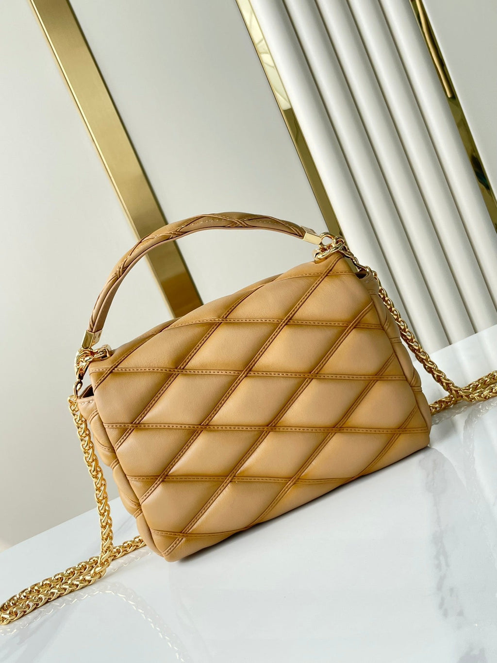 LOUIS VUITTON GO-14 PM 20 IN LIGHT FAWN QUILTED LAMBSKIN GOLD HARDWARE