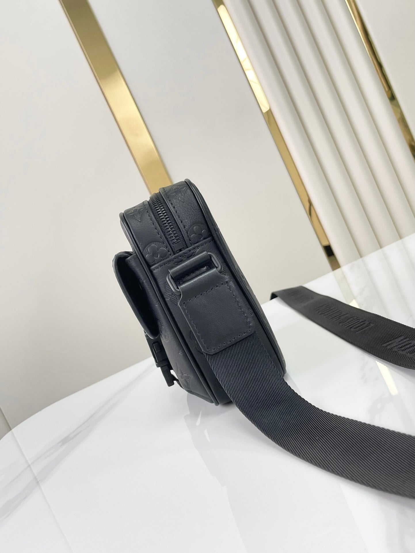 LOUIS VUITTON GETAWAY MESSENGER 18 IN BLACK EMBOSSED CALFSKIN