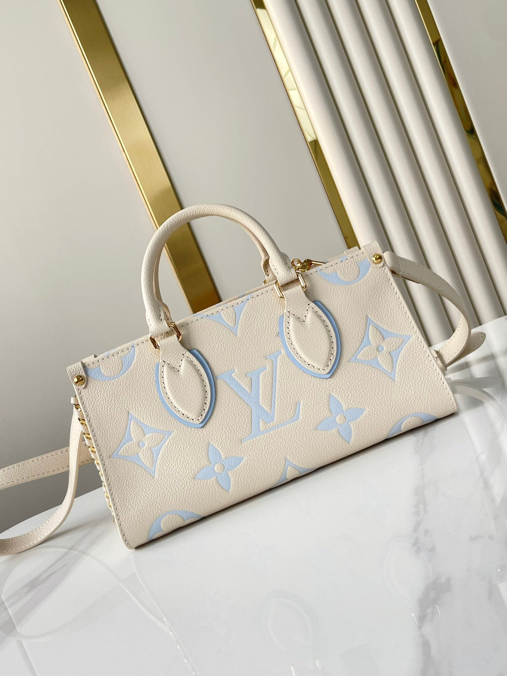 LOUIS VUITTON ONTHEGO 25 IN CREAM BLUE CALFSKIN GOLD HARDWARE