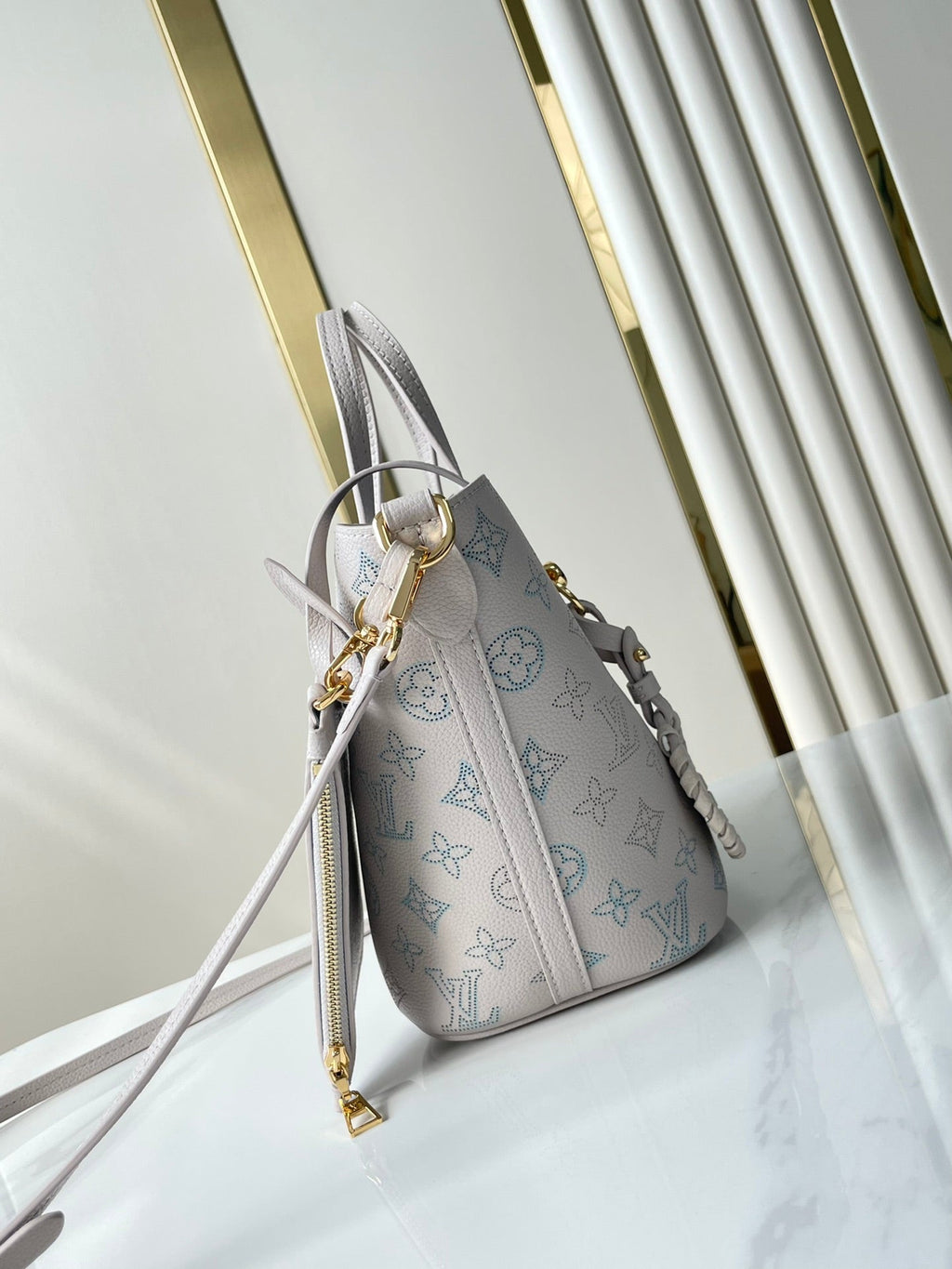 LOUIS VUITTON BLOSSOM PM 20 IN BLUME PERFORATED CALFSKIN