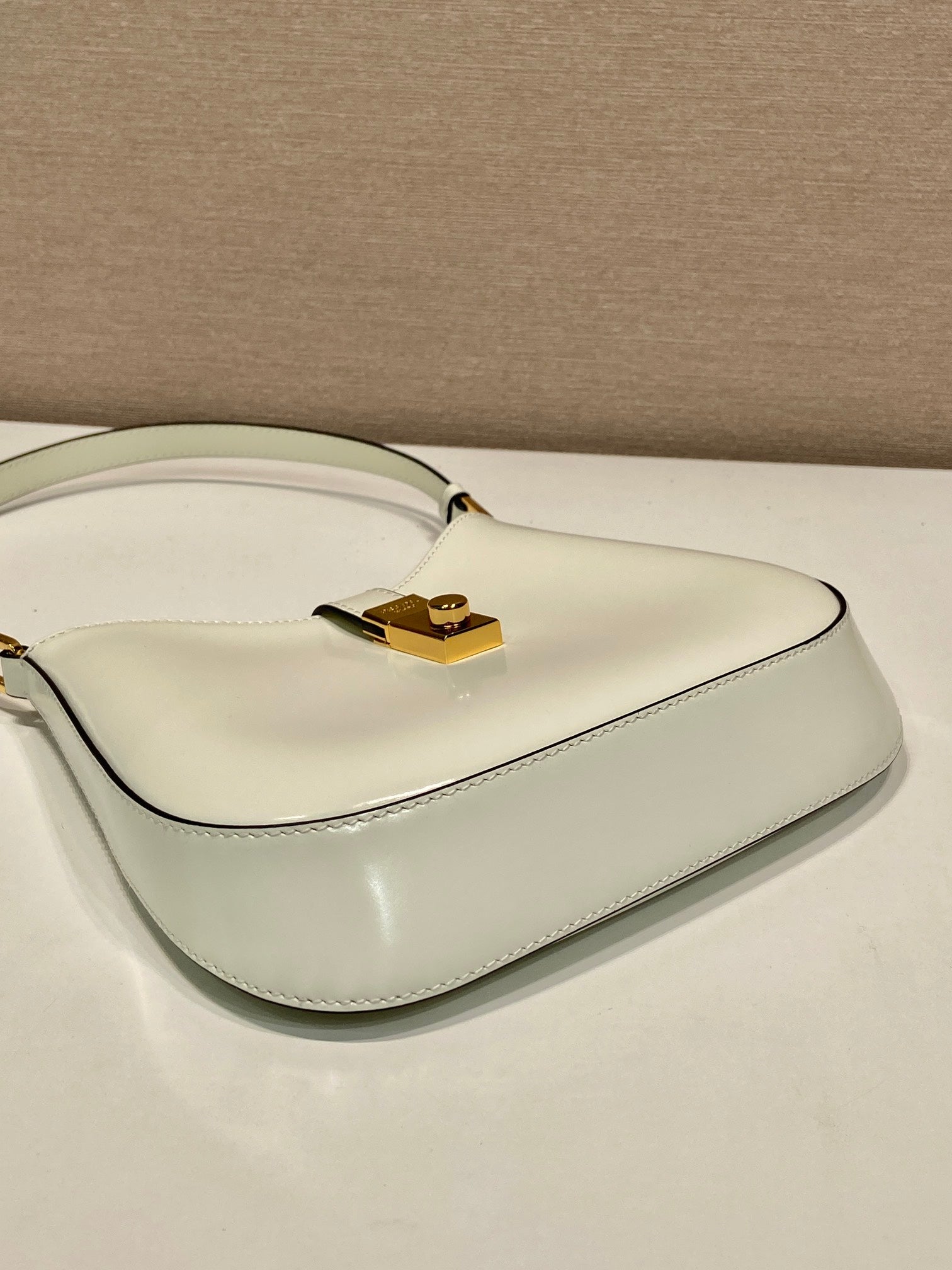 PRADA CLEO SHOULDER BAG 22 IN WHITE BRUSHED LAMBSKIN WITH CLASP CLOSURE