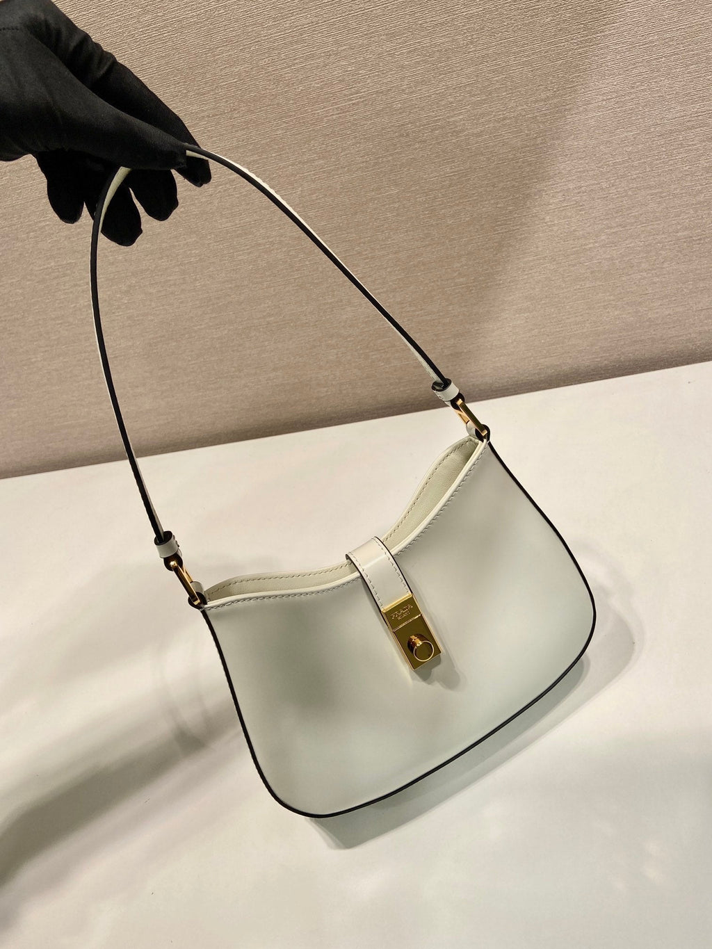 PRADA CLEO SHOULDER BAG 22 IN WHITE BRUSHED LAMBSKIN WITH CLASP CLOSURE