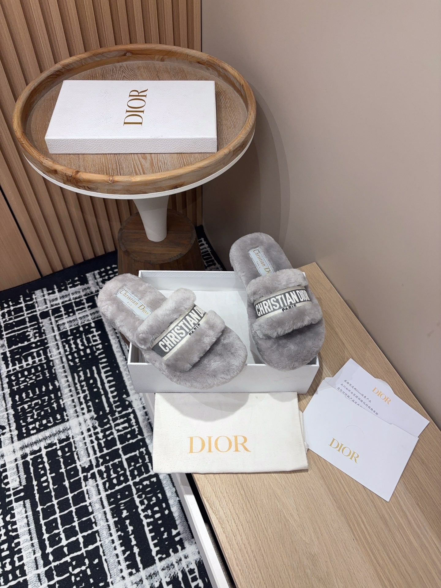 DIOR THICK-SOLE SLIPPERS IN PALE GRAY SHEARLING WITH EMBROIDERED LOGO