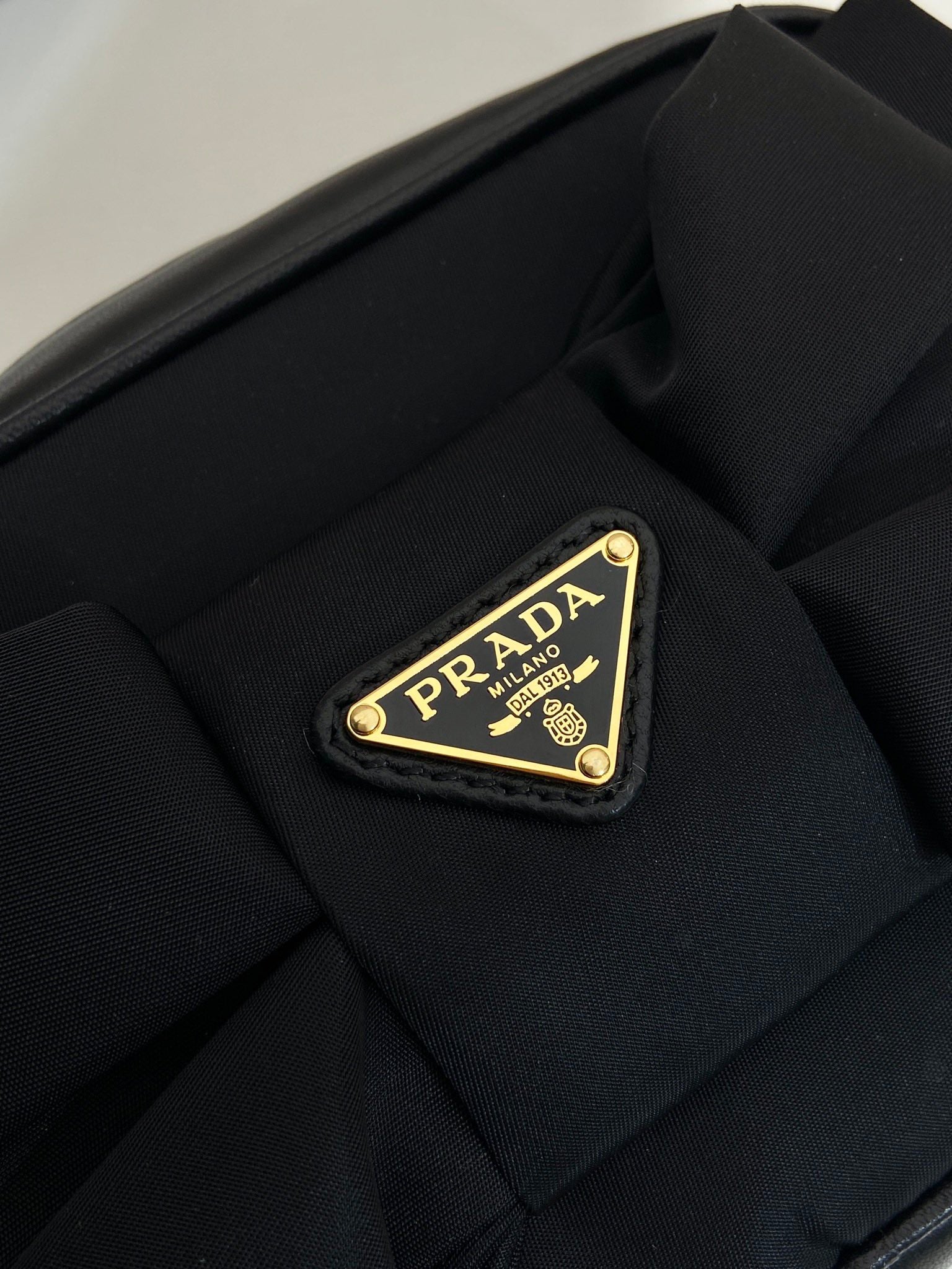 PRADA BOW BAG 18 IN BLACK RE-NYLON AND LAMBSKIN
