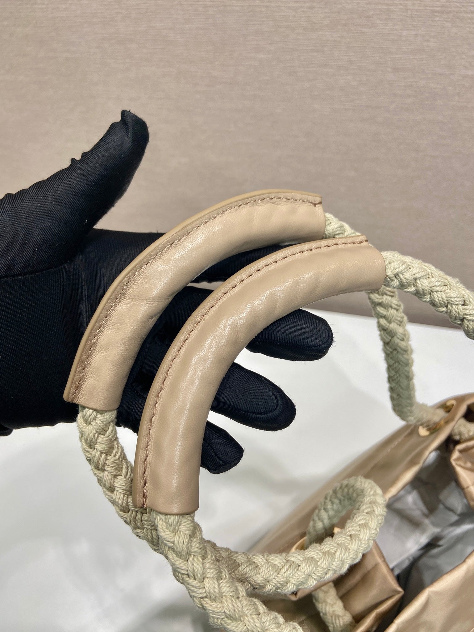 PRADA BUCKET BAG 28 IN BEIGE RE-NYLON GOLD LOGO