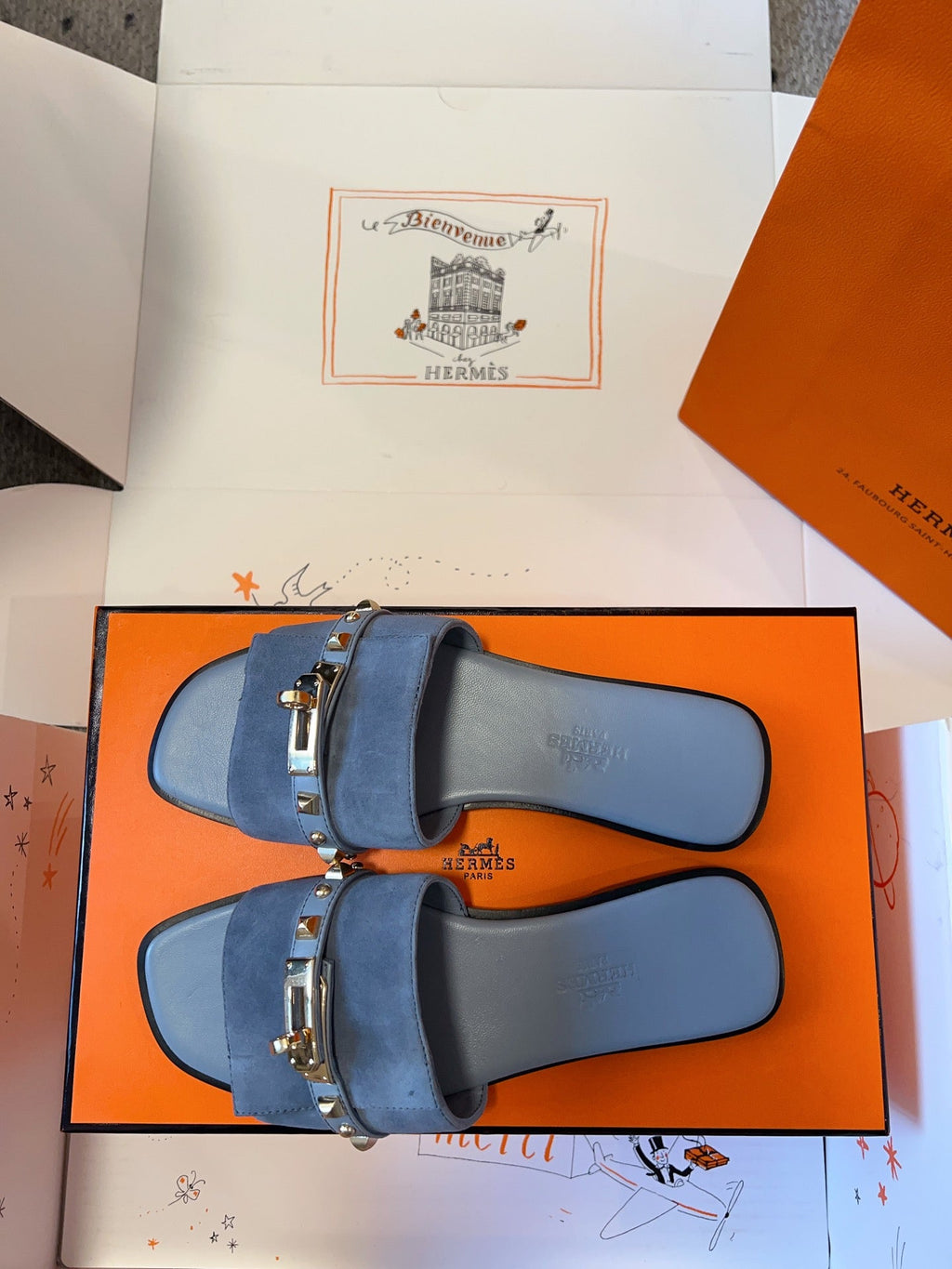 HERMES GIULIA FLAT SANDAL IN CERULEAN BLUE SUEDE