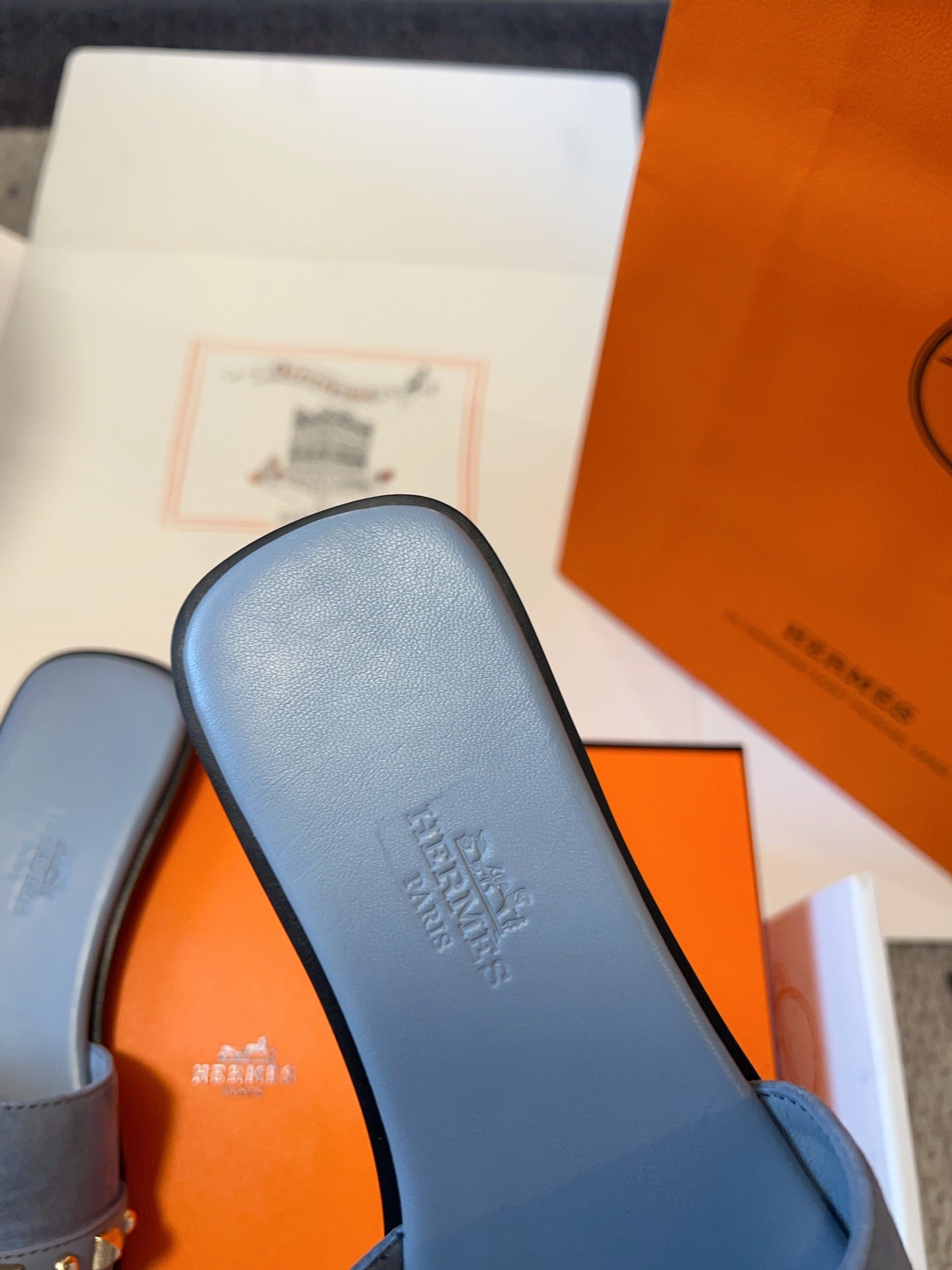 HERMES GIULIA FLAT SANDAL IN CERULEAN BLUE SUEDE