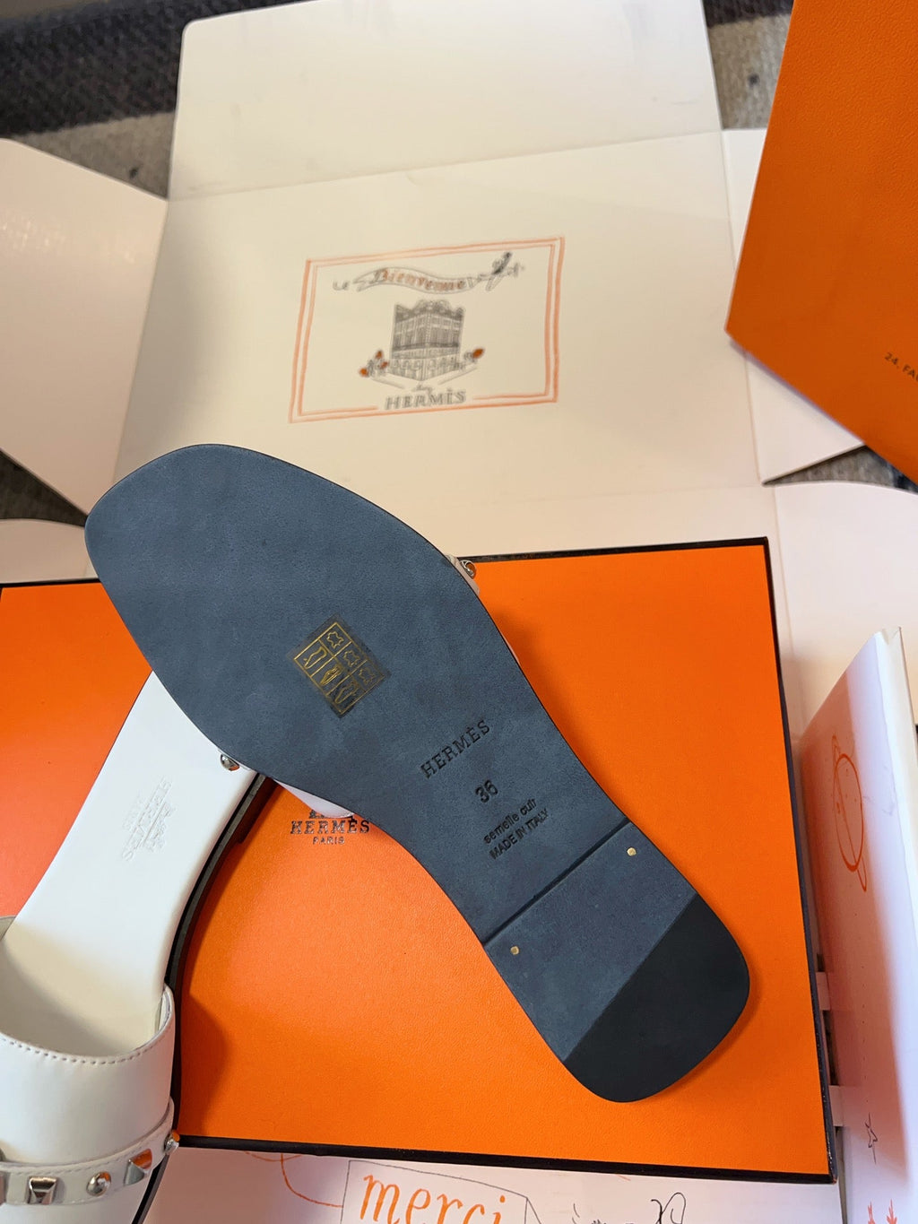 HERMES GIULIA FLAT SANDAL IN WHITE CALFSKIN