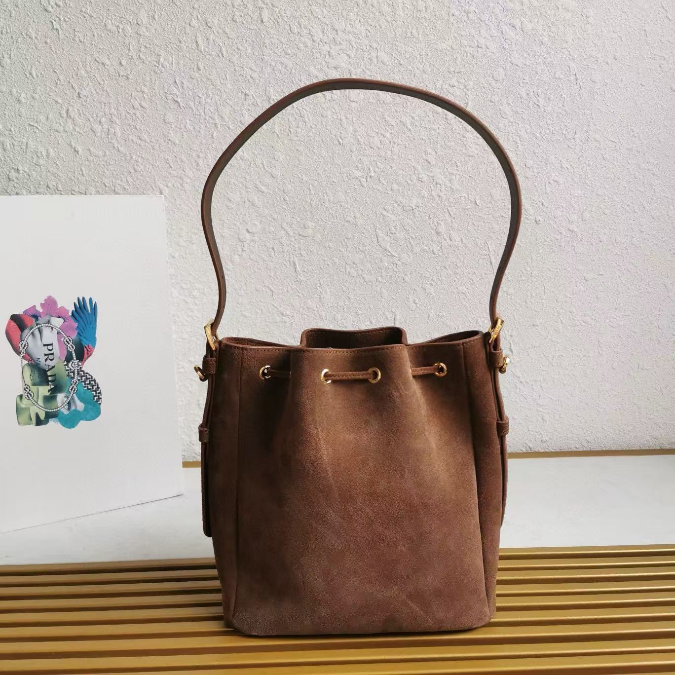 PRADA BUCKET BAG 21 IN BROWN SUEDE