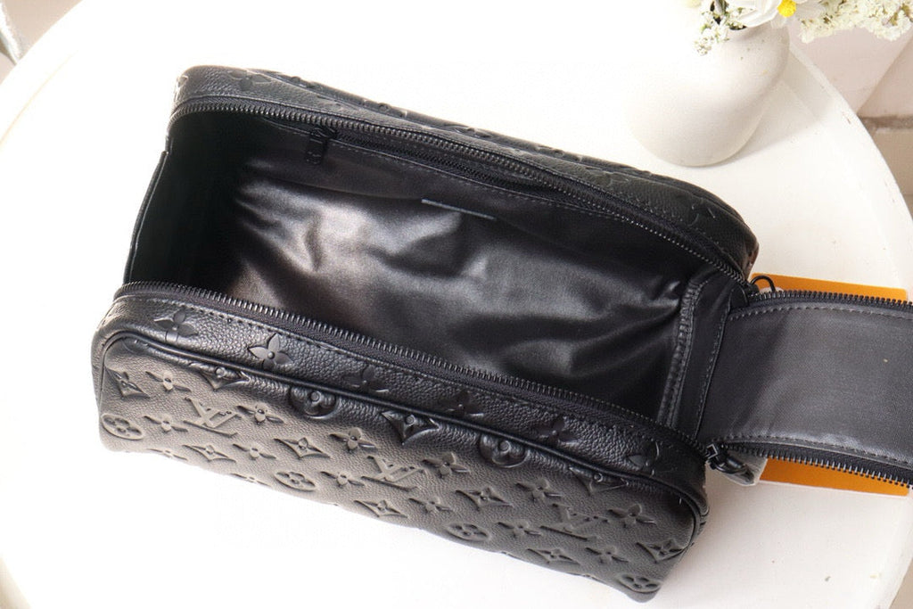 LOUIS VUITTON DOPP KIT TOILETRY BAG 28 CM IN BLACK TAURILLON MONOGRAM LEATHER