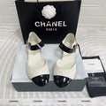 CHANEL CLASSIC MARY JANE FLATS IN WHITE AND BLACK QUILTED CALFSKIN