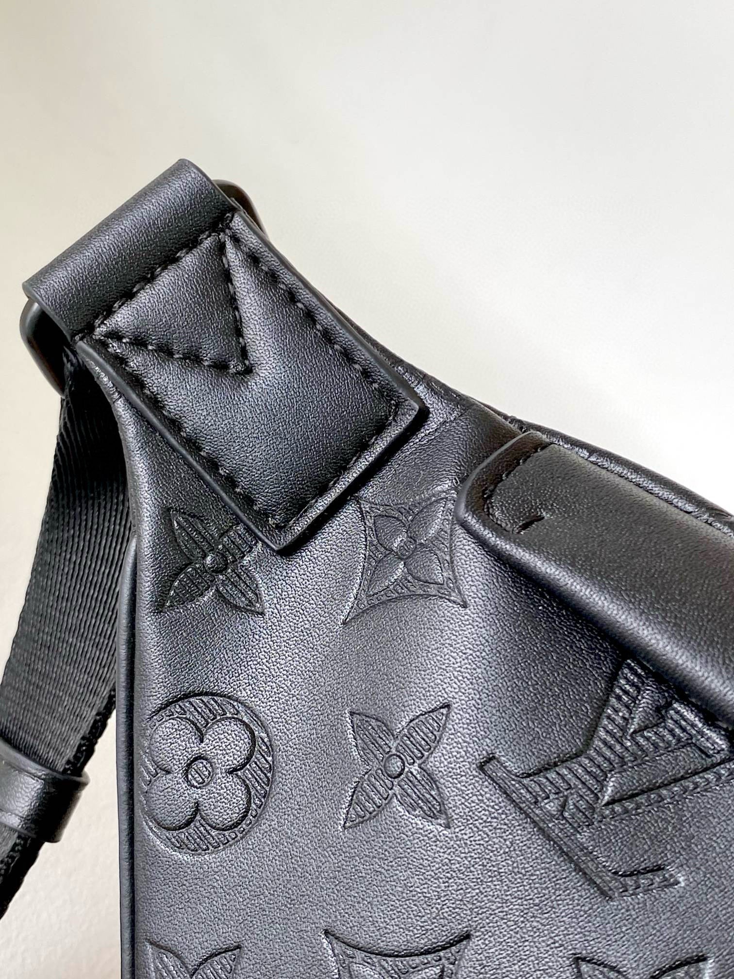 LOUIS VUITTON LV BELT BAG 44 IN BLACK EMBOSSED MONOGRAM CALFSKIN