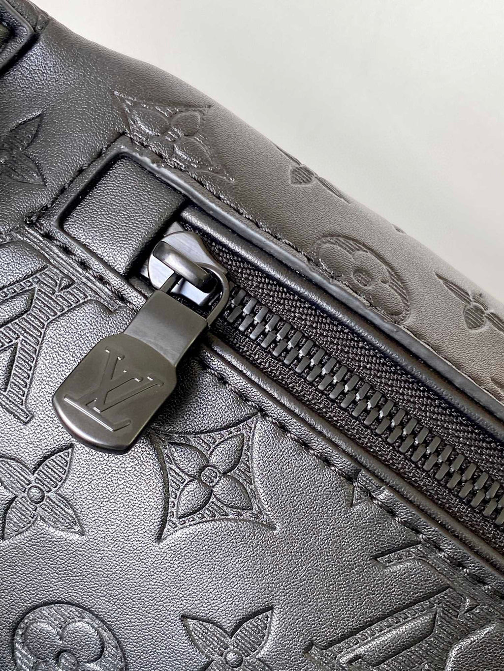 LOUIS VUITTON LV BELT BAG 44 IN BLACK EMBOSSED MONOGRAM CALFSKIN