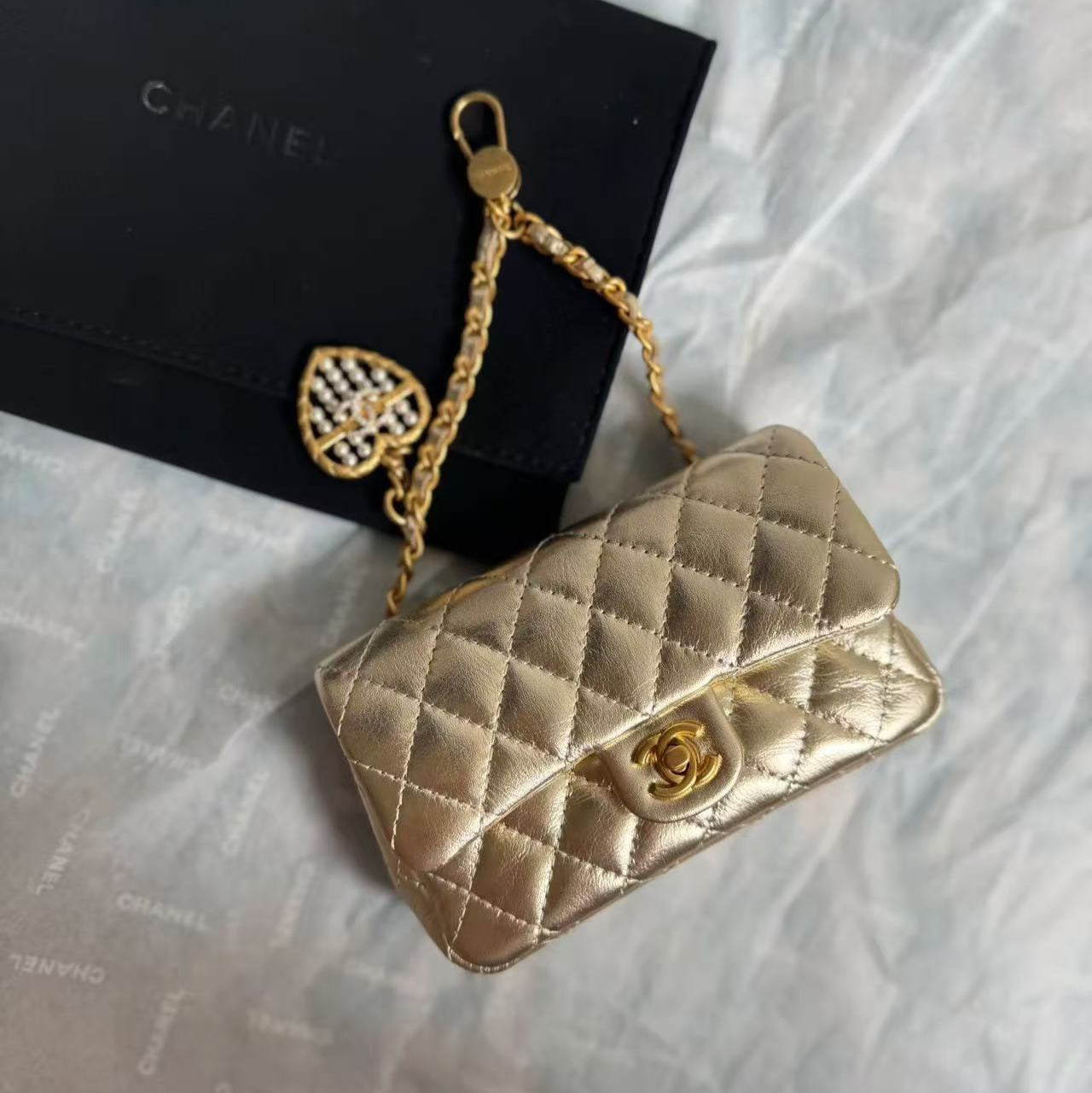 CHANEL CLASSIC FLAP BAG 13 IN GOLD LAMBSKIN WITH PEARL HEART CHARM