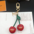 LOUIS VUITTON LV KEYCHAIN CHERRY IN RED RESIN AND METAL