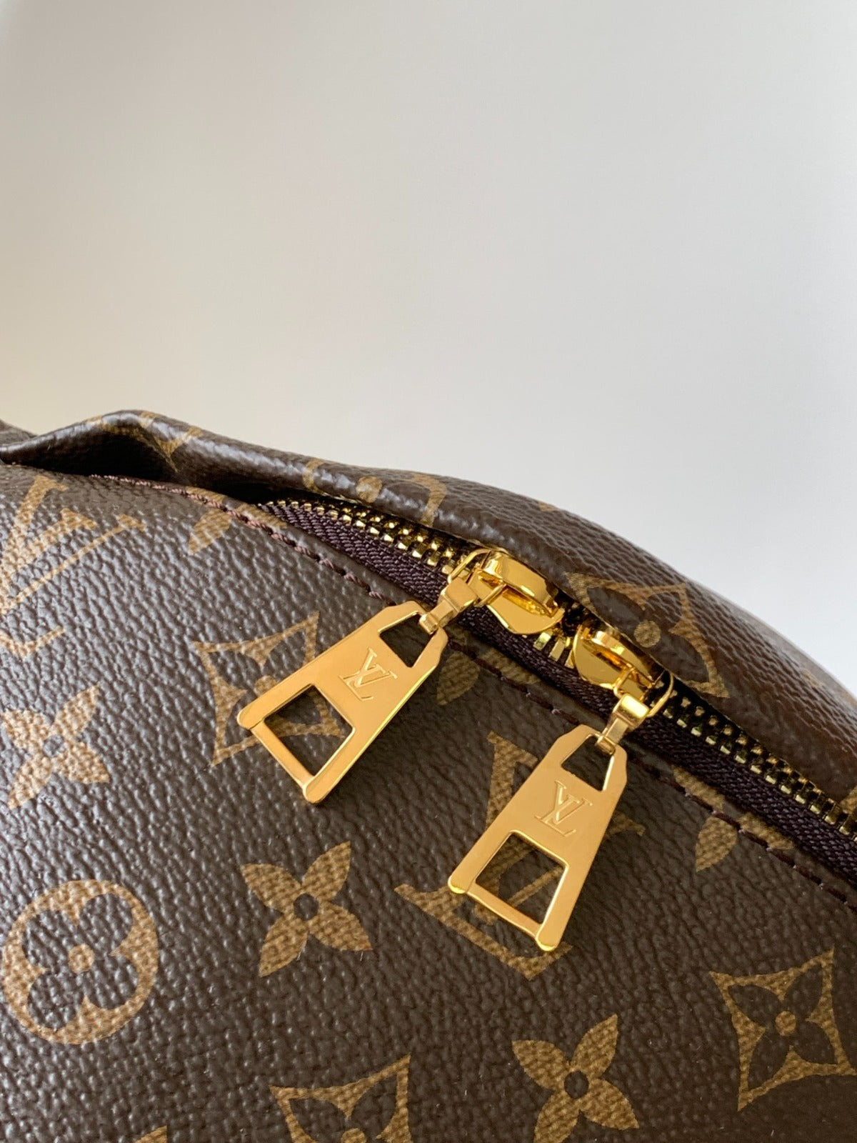 LOUIS VUITTON LV BUMBAG 37 IN BROWN COATED MONOGRAM CANVAS