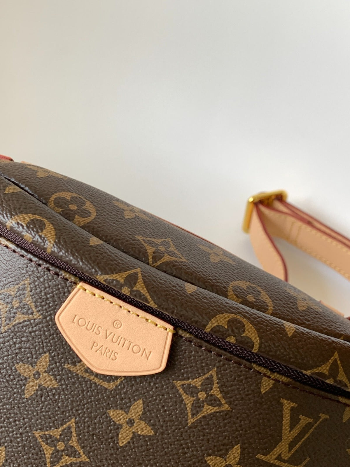 LOUIS VUITTON LV BUMBAG 37 IN BROWN COATED MONOGRAM CANVAS