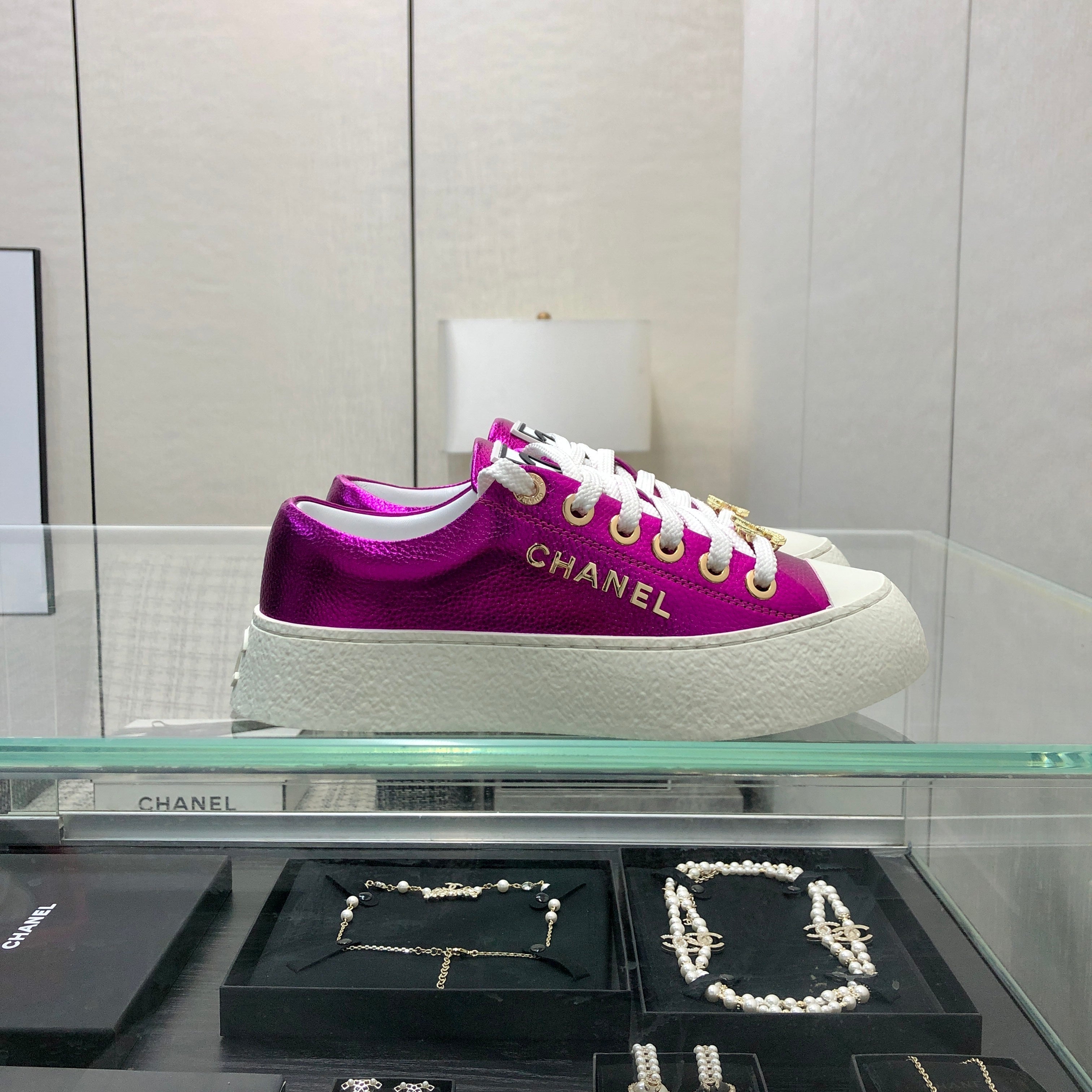 CHANEL CASUAL SNEAKER IN MAGENTA PURPLE METALLIC LAMBSKIN WITH GOLD LOGO