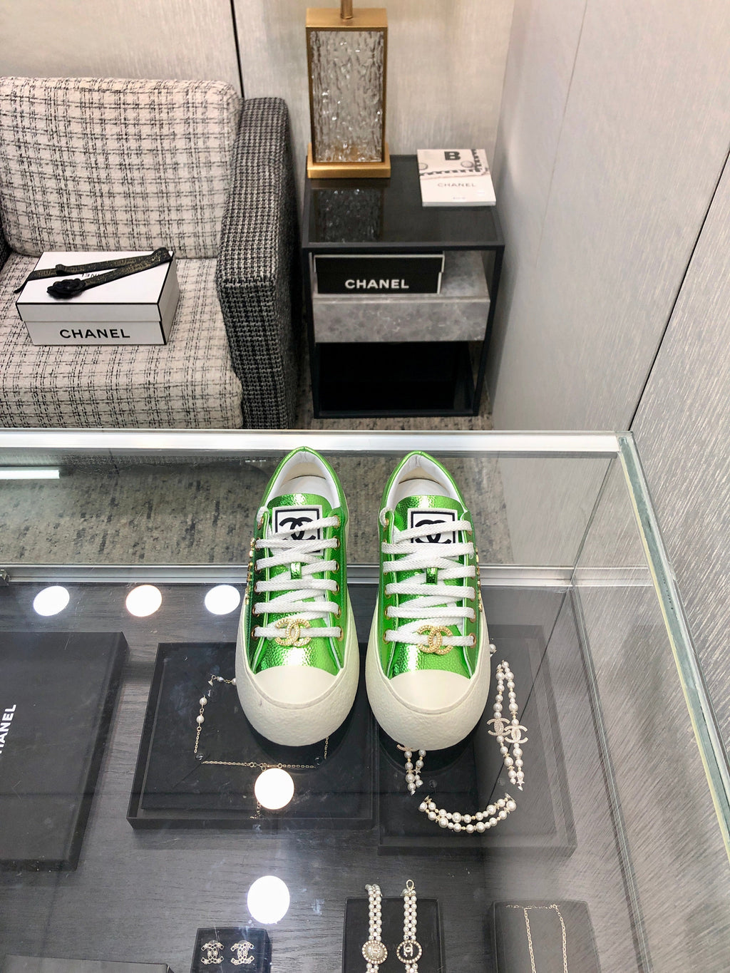 CHANEL CASUAL SNEAKER IN EMERALD GREEN METALLIC LAMBSKIN WITH GOLD LOGO