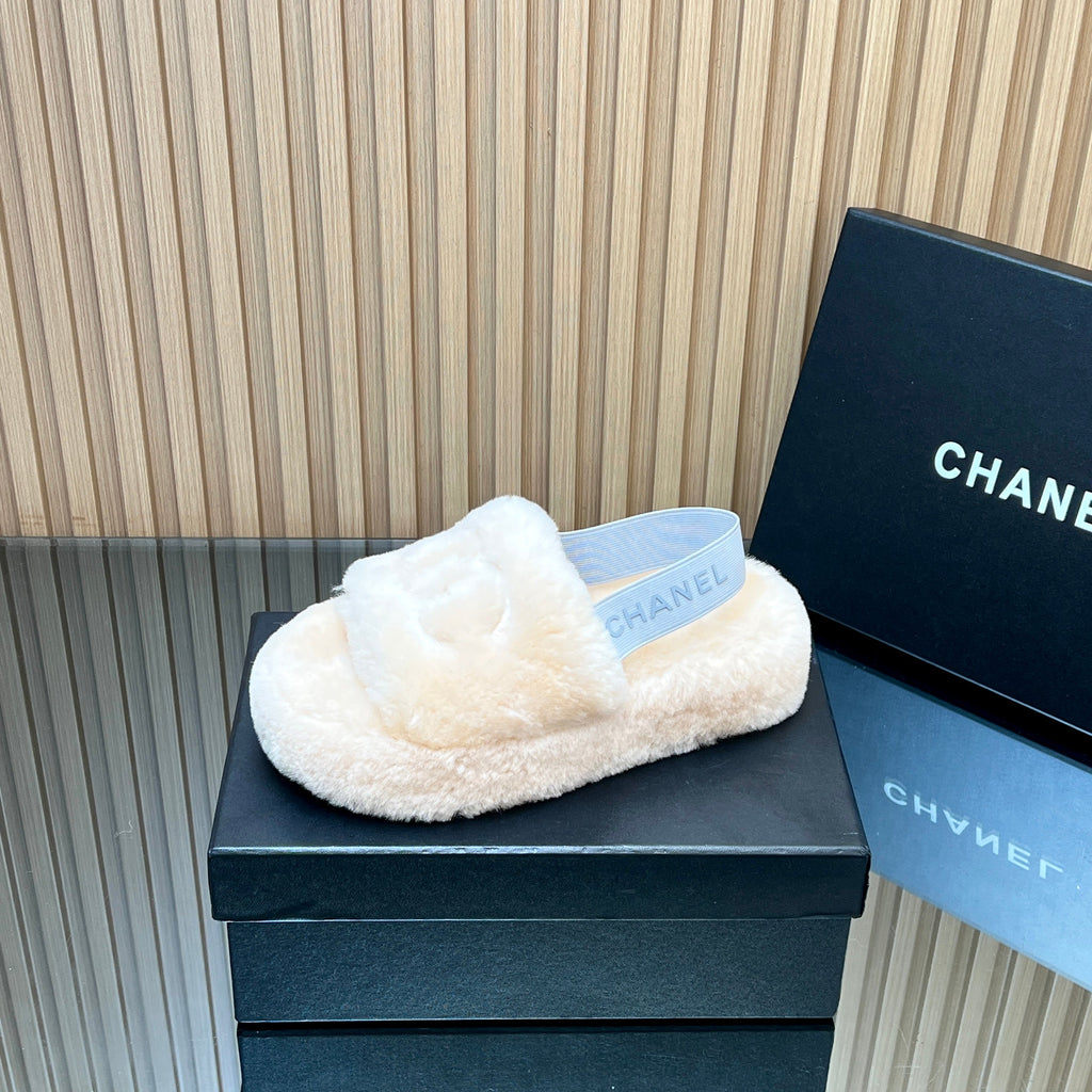 CHANEL 25S THICK-SOLED FURRY SLIPPERS WITH ELASTIC STRAPS IN BEIGE FUR