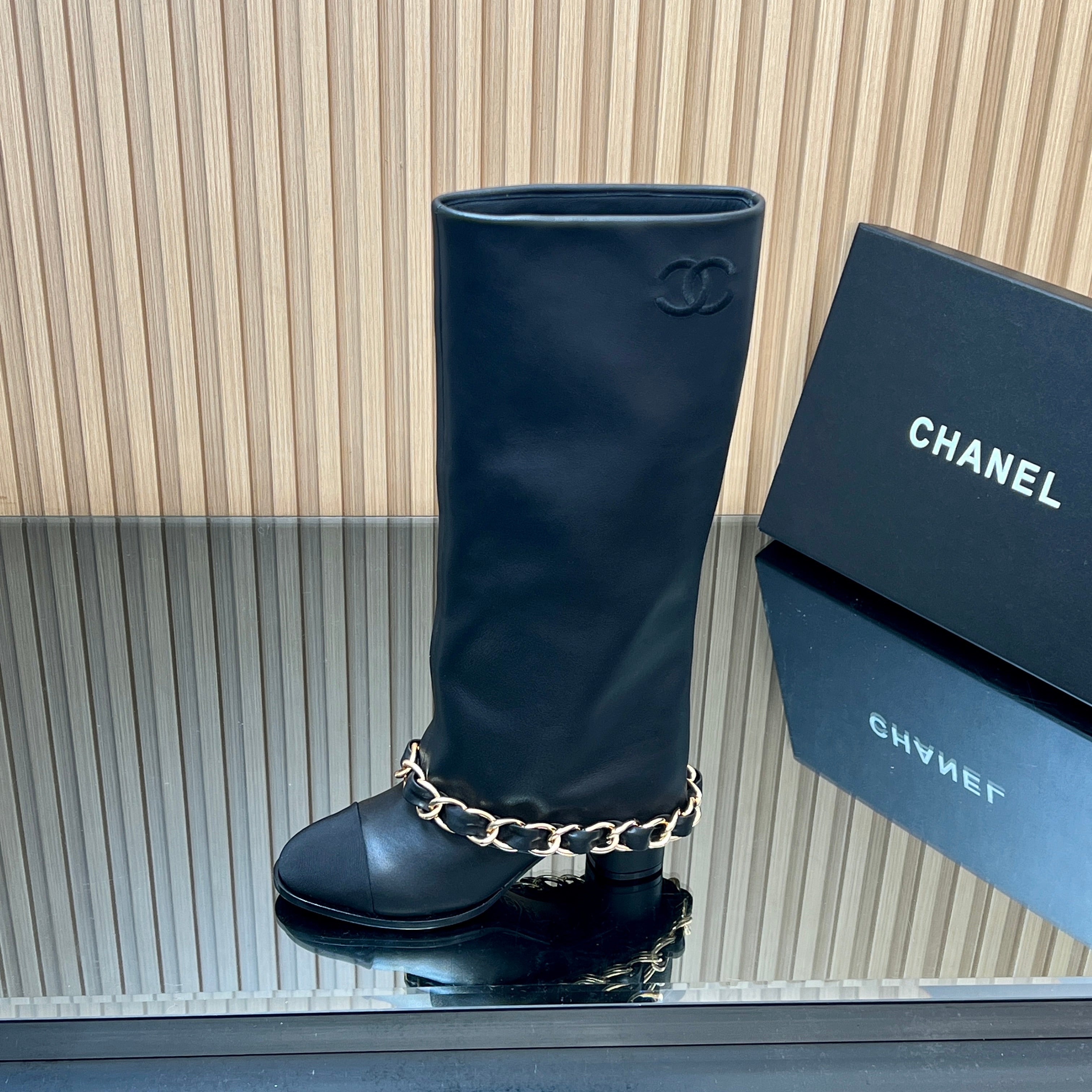 CHANEL 25S KNEE-HIGH HEELED BOOTS 65MM IN BLACK CALFSKIN GOLD HARDWARE