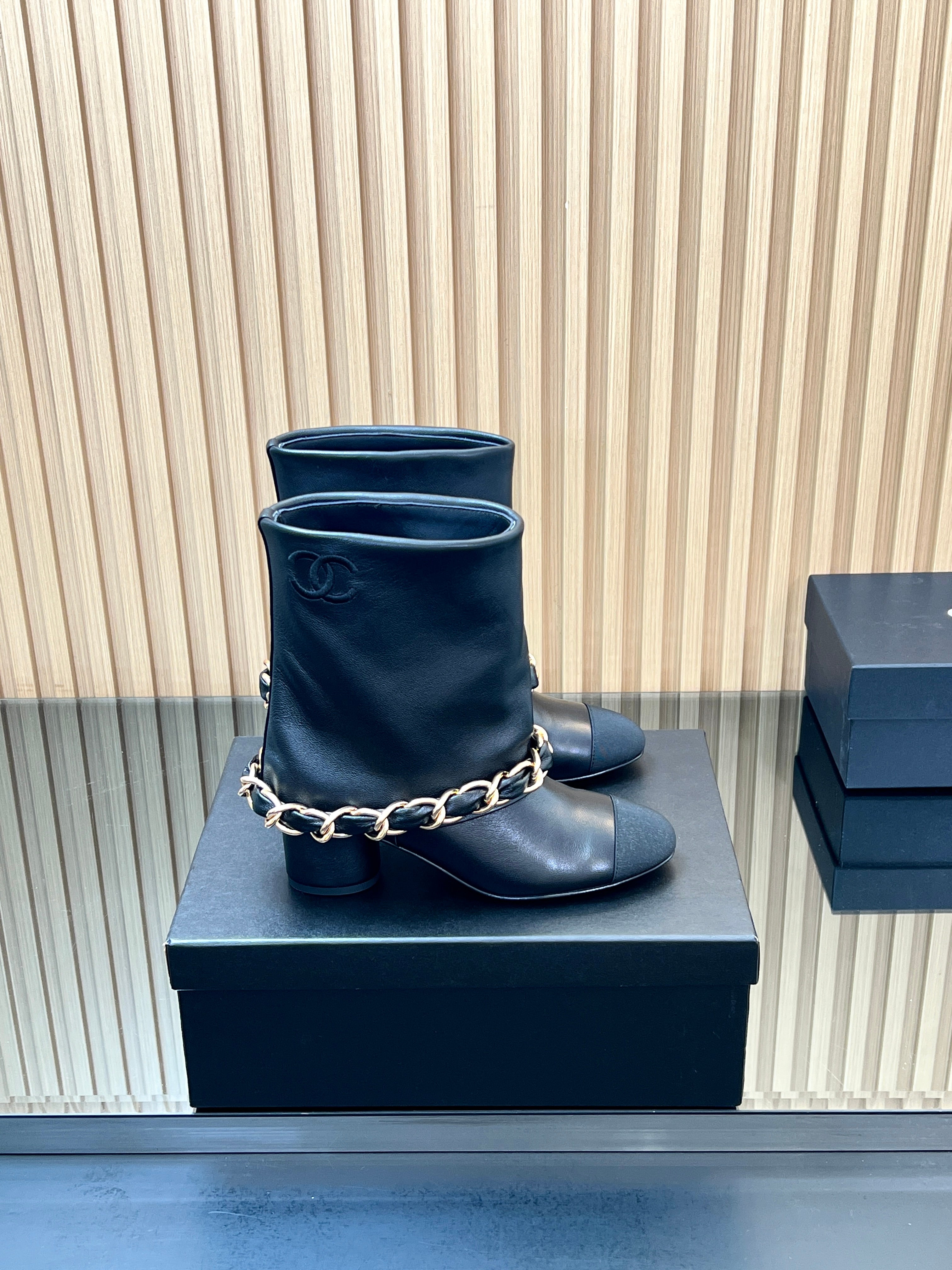 CHANEL 25S LOW BOOTS 65MM IN BLACK CALFSKIN GOLD HARDWARE