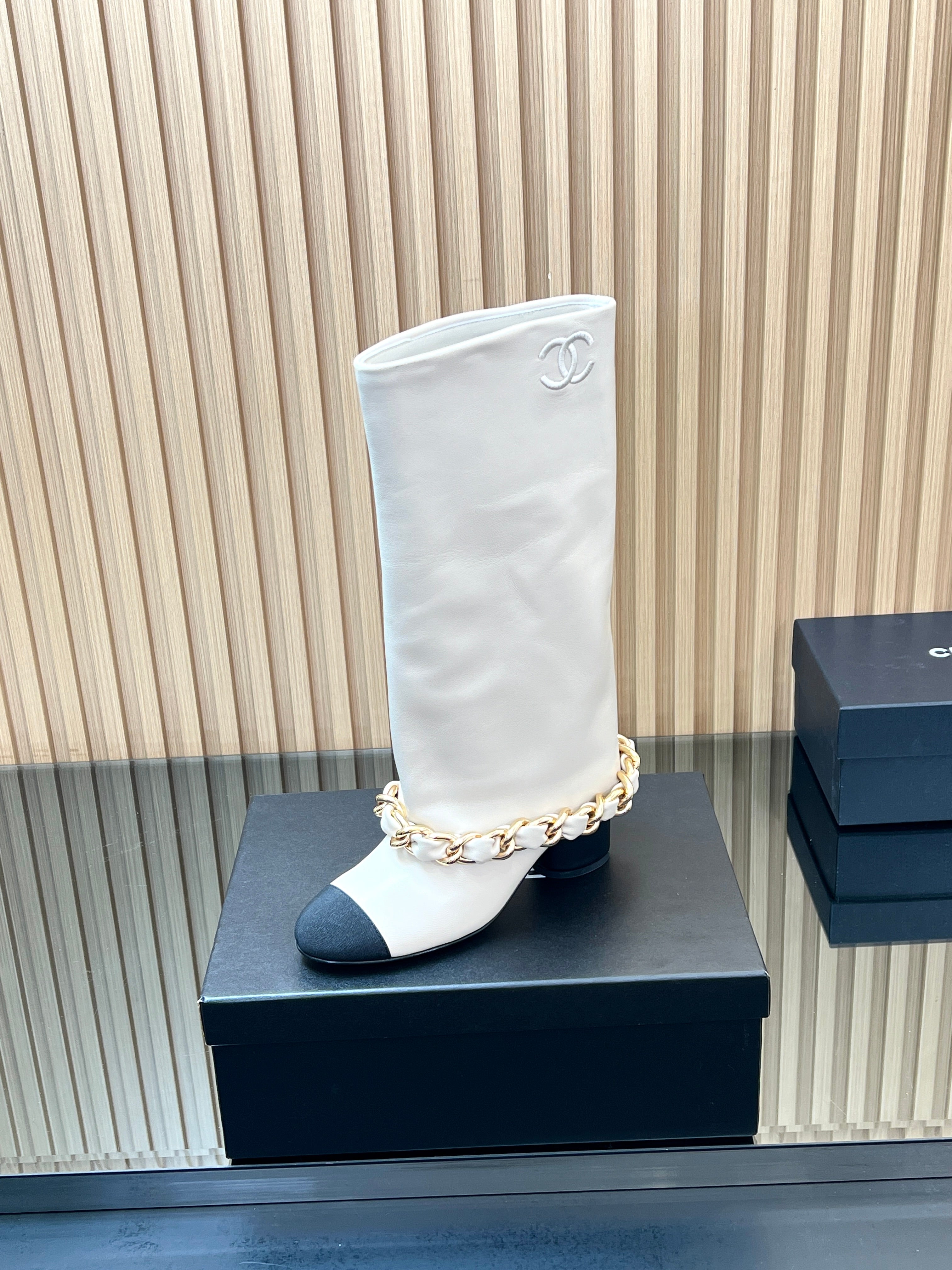 CHANEL 25S HIGH BOOTS 65MM IN WHITE CALFSKIN GOLD HARDWARE