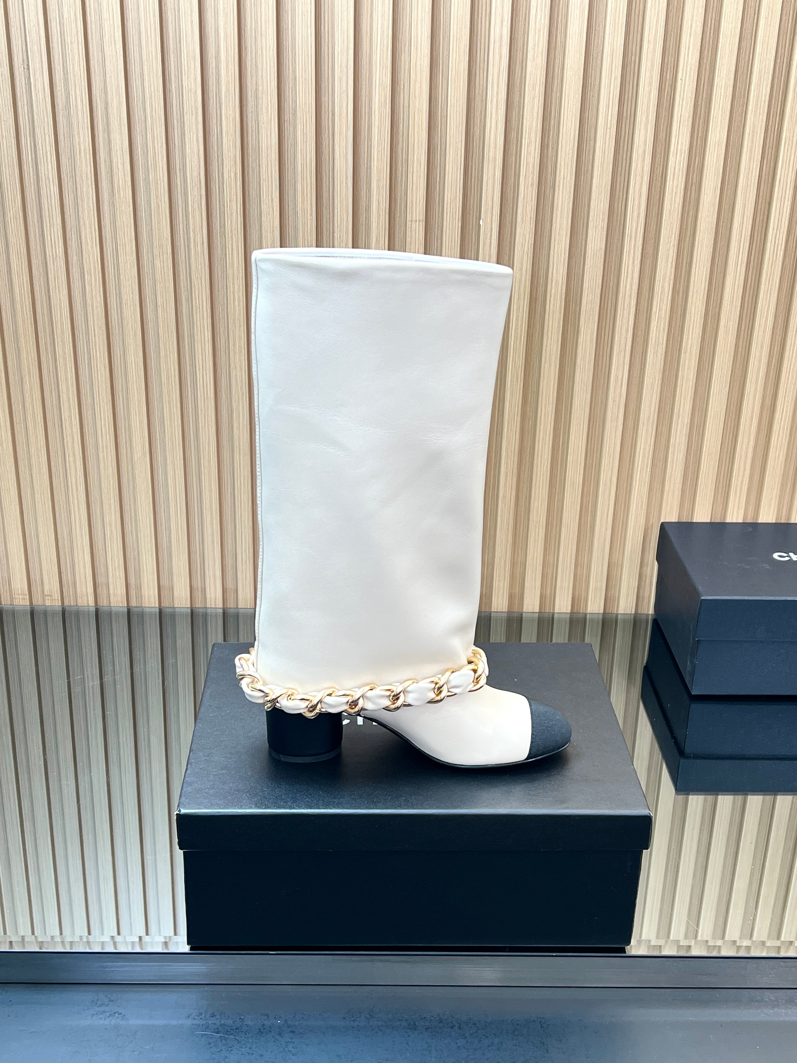 CHANEL 25S HIGH BOOTS 65MM IN WHITE CALFSKIN GOLD HARDWARE