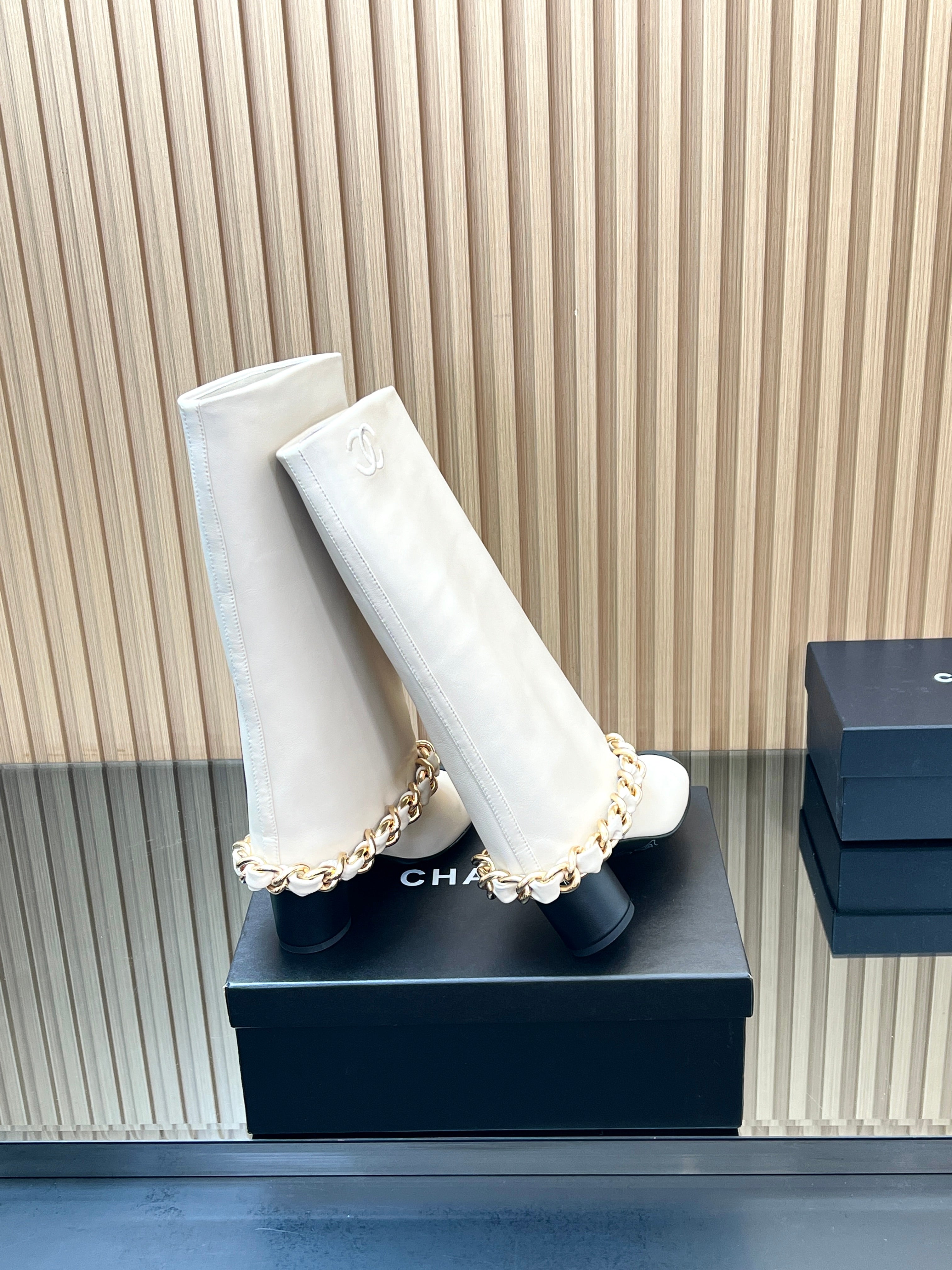 CHANEL 25S HIGH BOOTS 65MM IN WHITE CALFSKIN GOLD HARDWARE