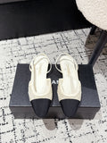 CHANEL SLINGBACK 25S IN OFF WHITE AND BLACK FABRIC