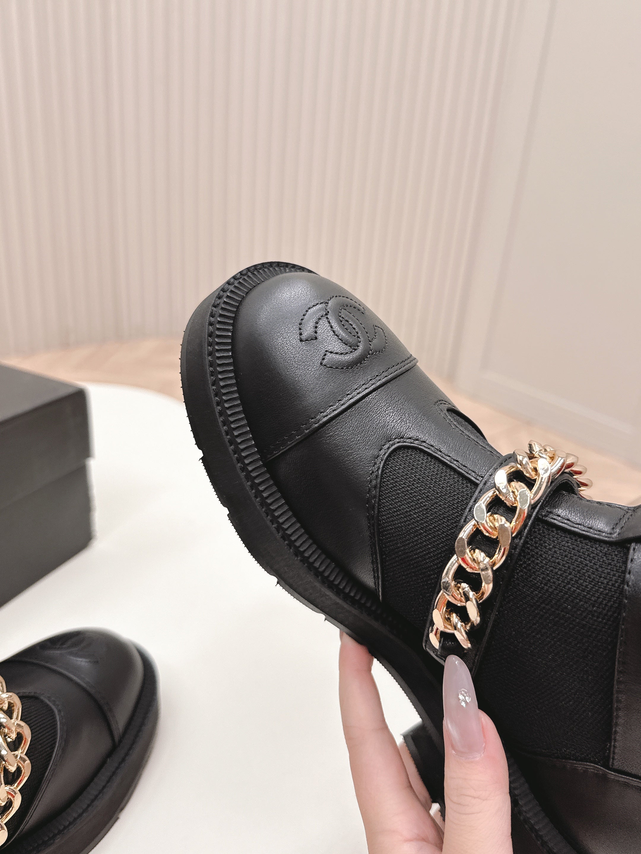 CHANEL ANKLE BOOTS 25S IN BLACK LAMBSKIN AND FABRIC WITH GOLD HARDWARE
