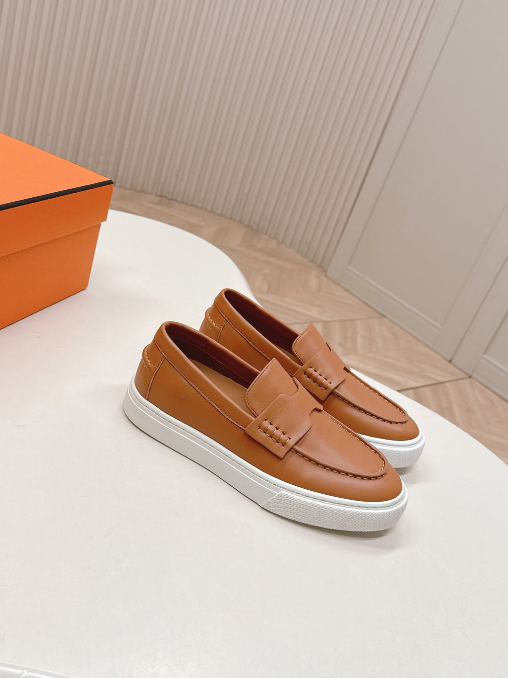 HERMES 25S SLIP-ON IN BROWN LAMBSKIN