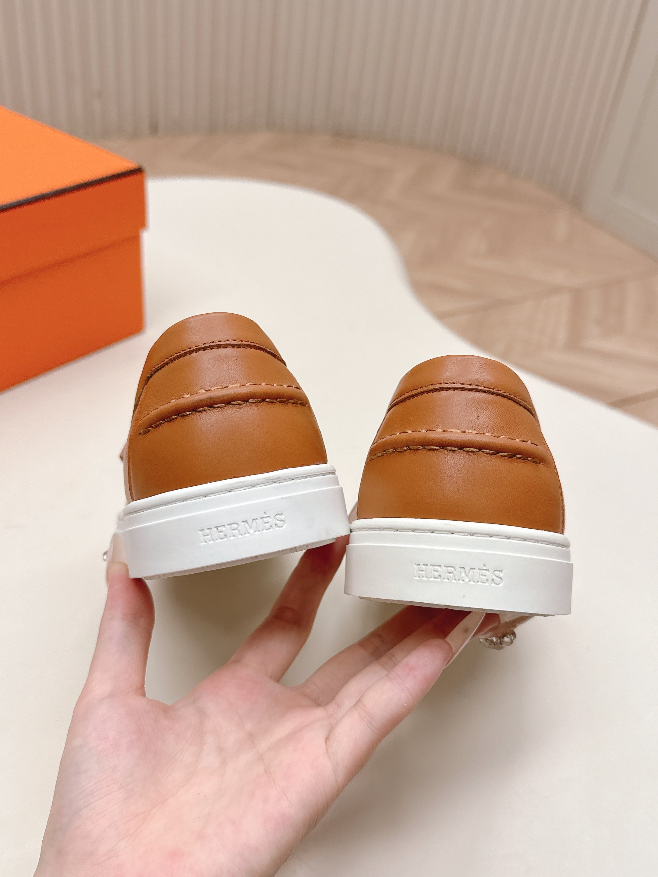 HERMES 25S SLIP-ON IN BROWN LAMBSKIN