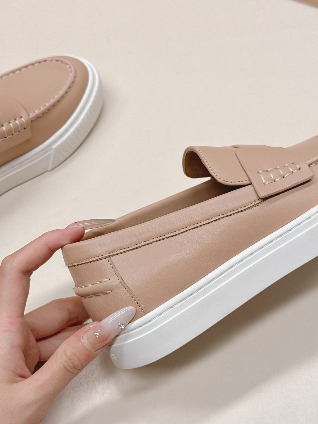 HERMES 25S SLIP-ON IN SOFT NUDE PINK LAMBSKIN