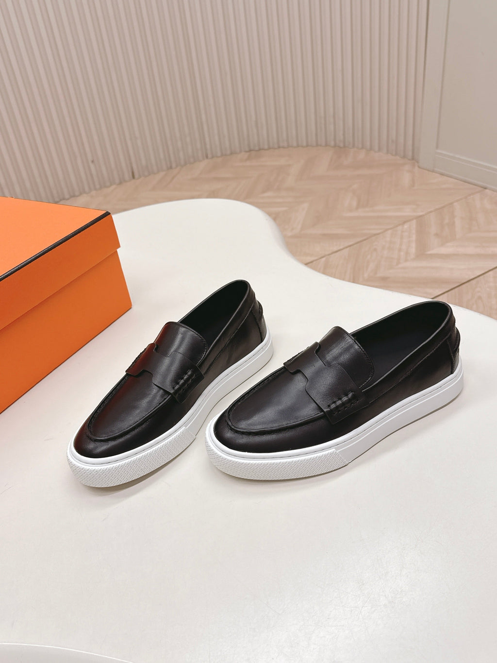 HERMES 25S SLIP-ON IN BLACK LAMBSKIN