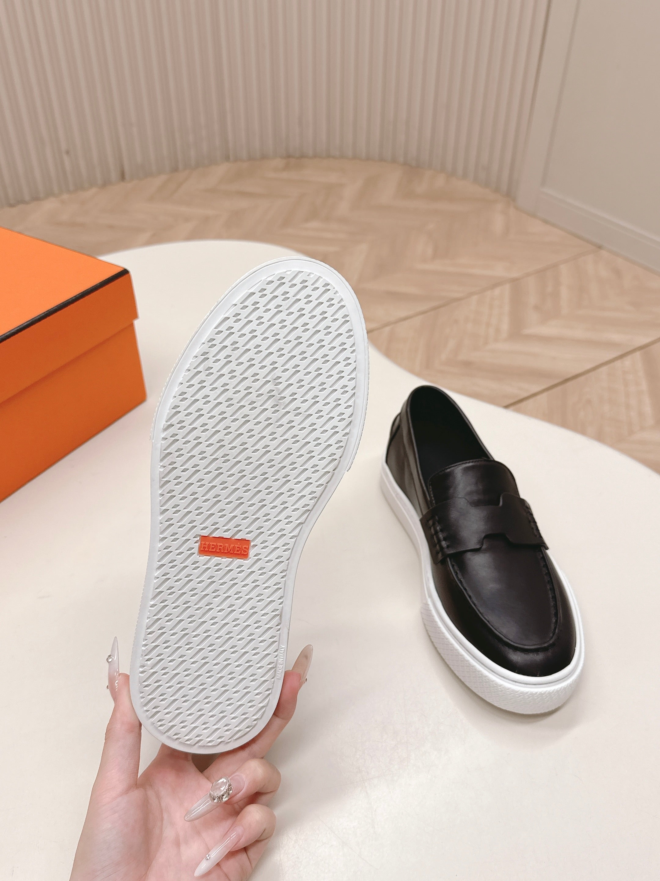 HERMES 25S SLIP-ON IN BLACK LAMBSKIN