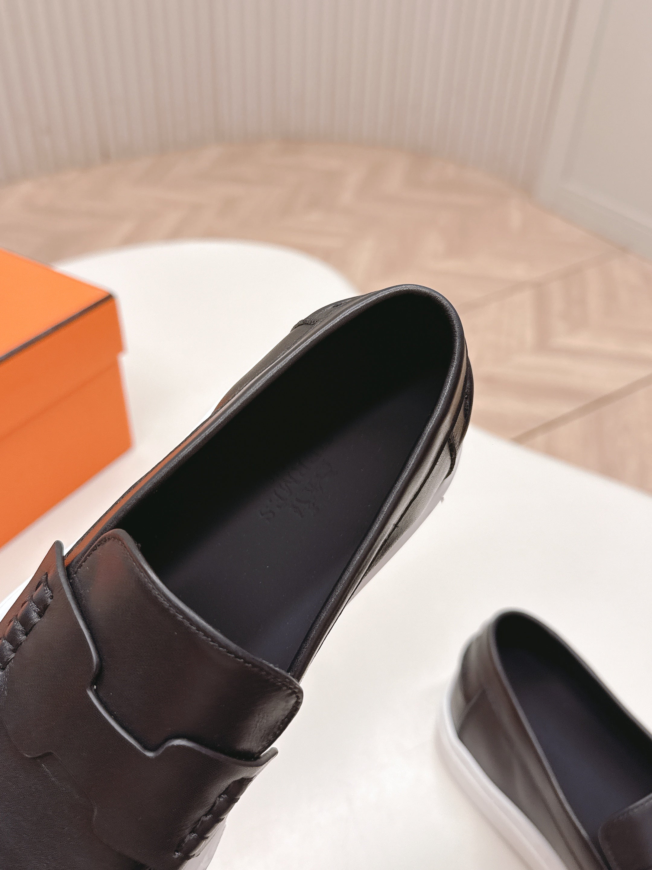 HERMES 25S SLIP-ON IN BLACK LAMBSKIN