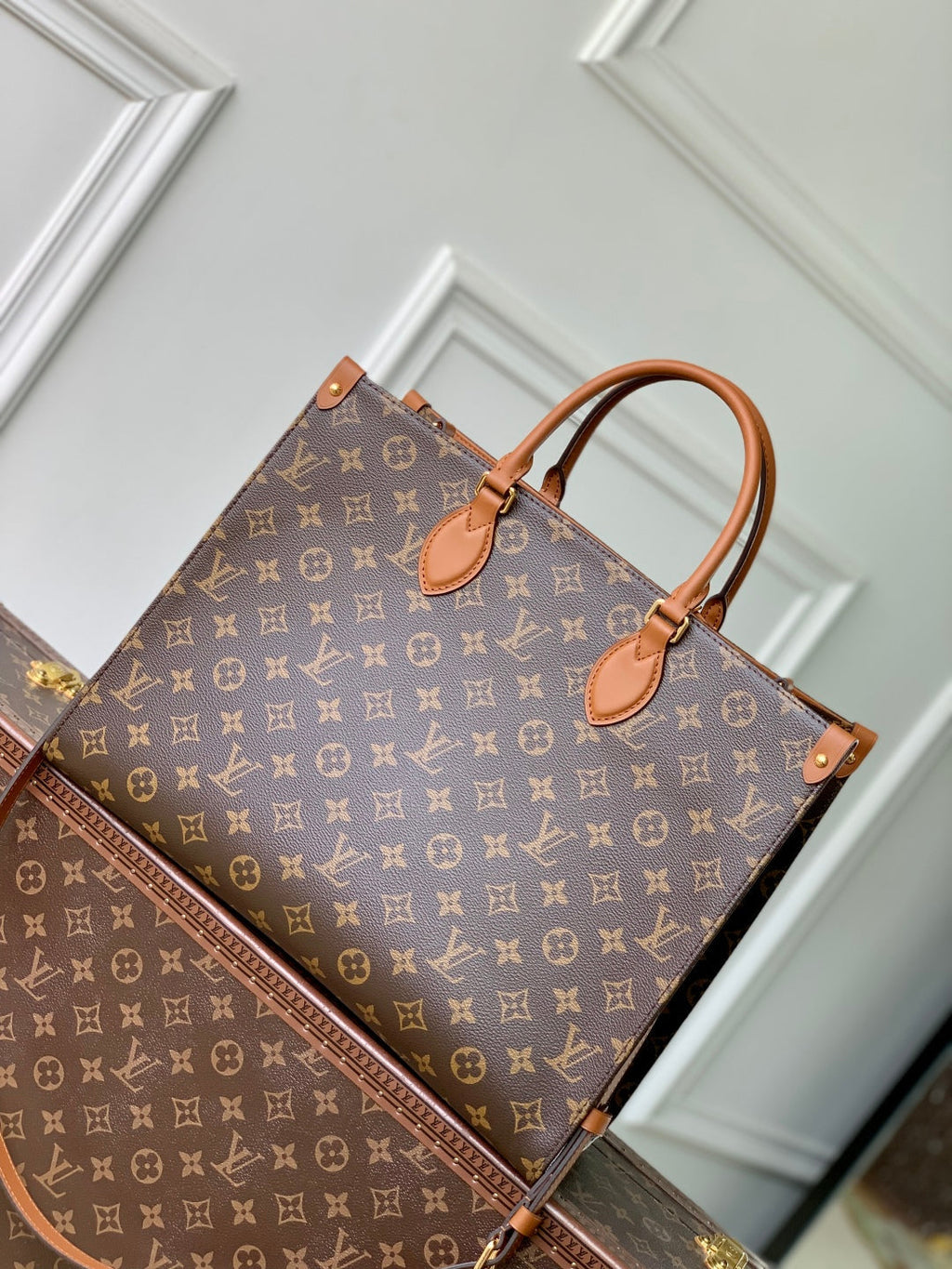 LOUIS VUITTON ONTHEGO ORGANIZER 37 IN BROWN COATED CANVAS AND CALFSKIN