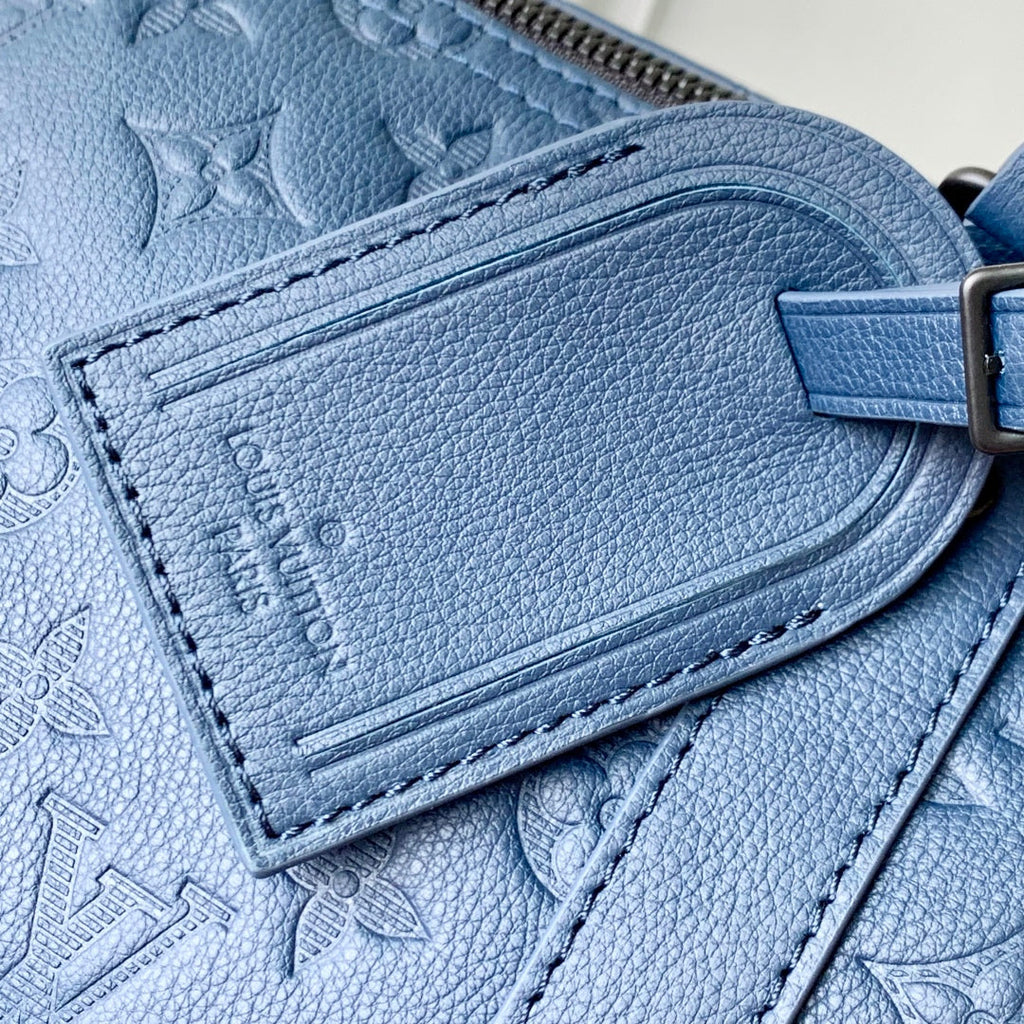 LOUIS VUITTON KEEPALL BANDOULIÈRE 50 IN DARK BLUE MONOGRAM SHADOW EMBOSSED CALFSKIN