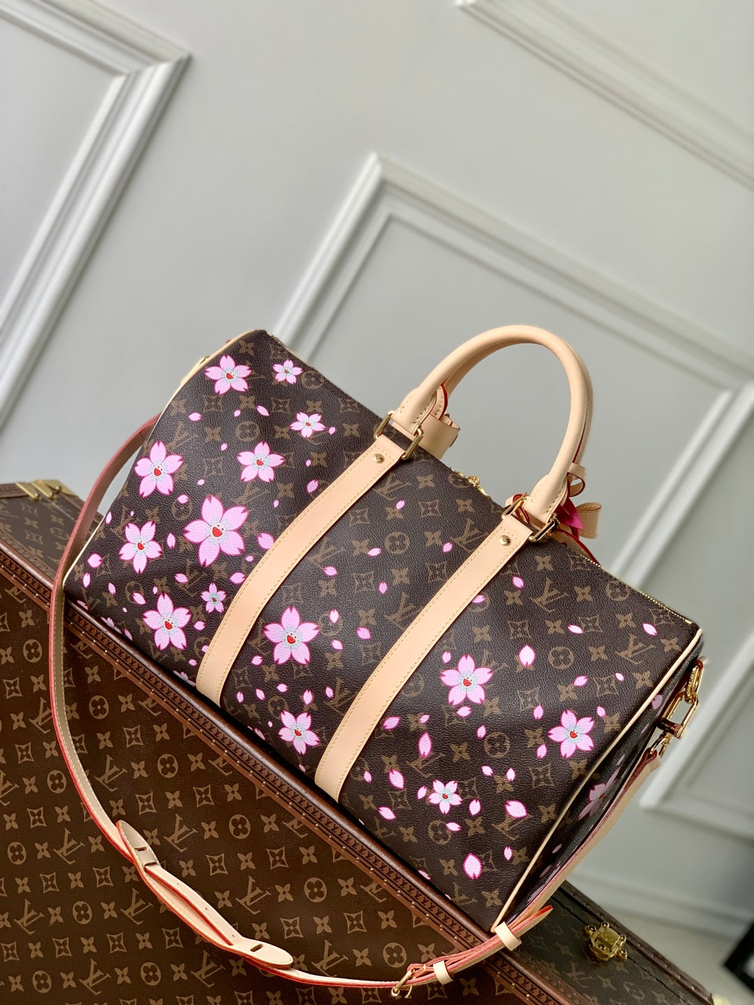 LOUIS VUITTON KEEPALL BANDOULIÈRE CHERRY BLOSSOM 45 IN SAKURA BROWN MONOGRAM COATED CANVAS