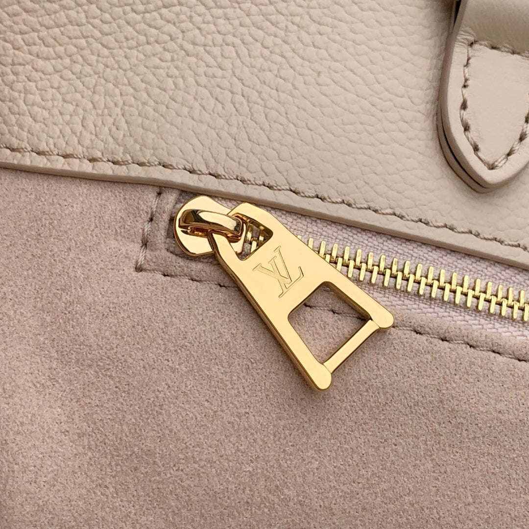 LOUIS VUITTON ONTHEGO MM 35 IN  BLUSH PINK MONOGRAM CALFSKIN