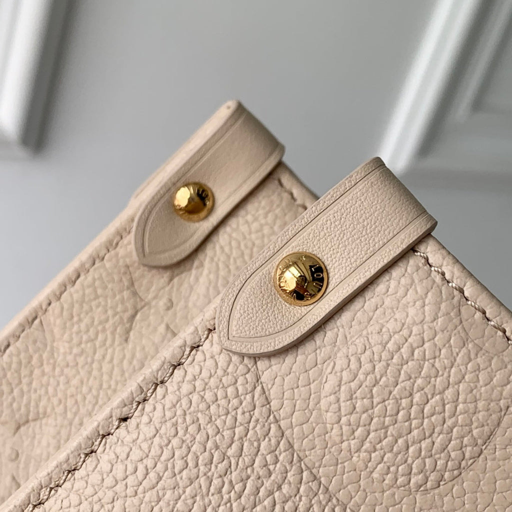 LOUIS VUITTON ONTHEGO MM 35 IN  BLUSH PINK MONOGRAM CALFSKIN