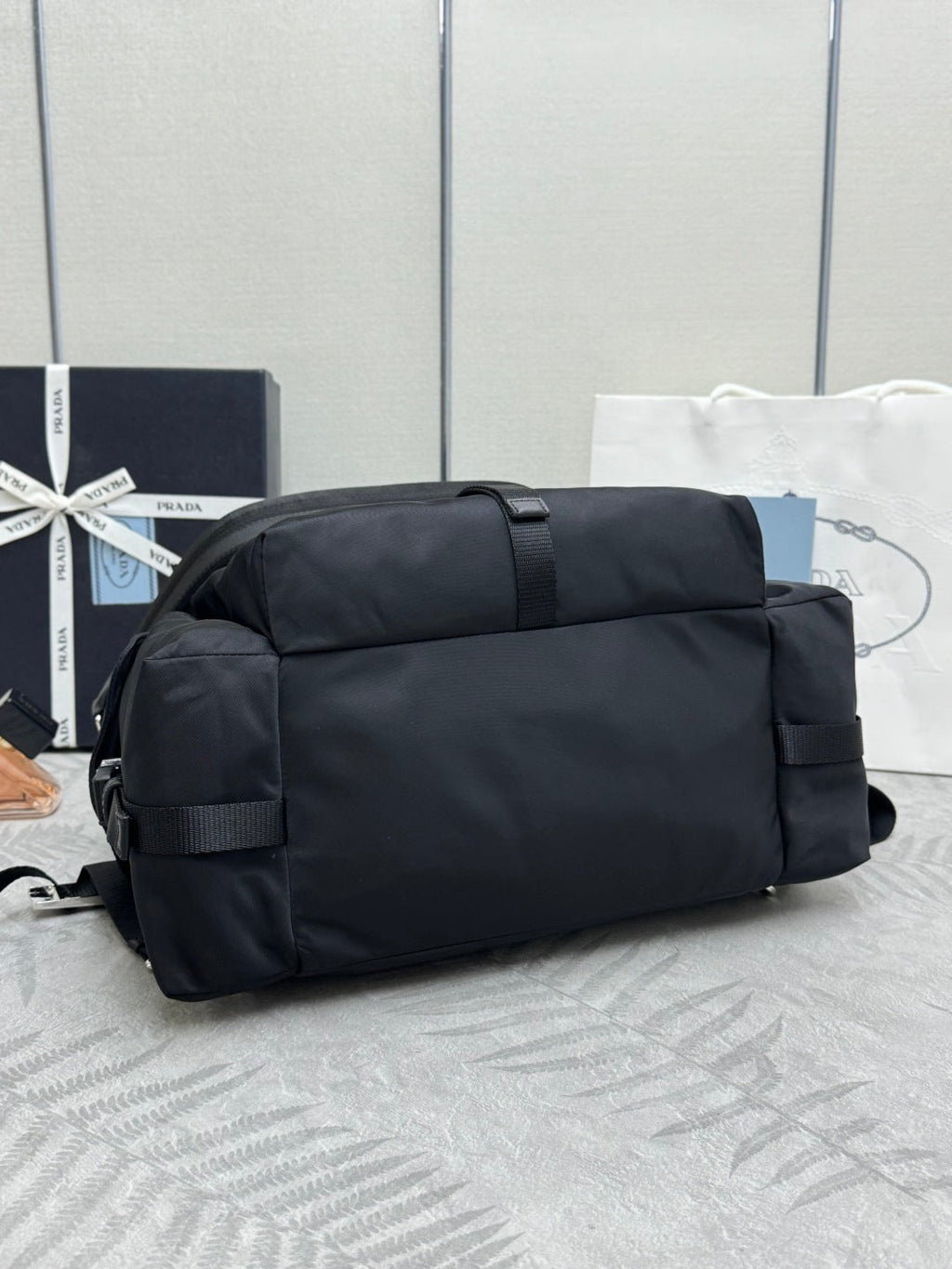 PRADA 25S EXPLORE BACKPACK 39 IN BLACK RE-NYLON AND CALFSKIN