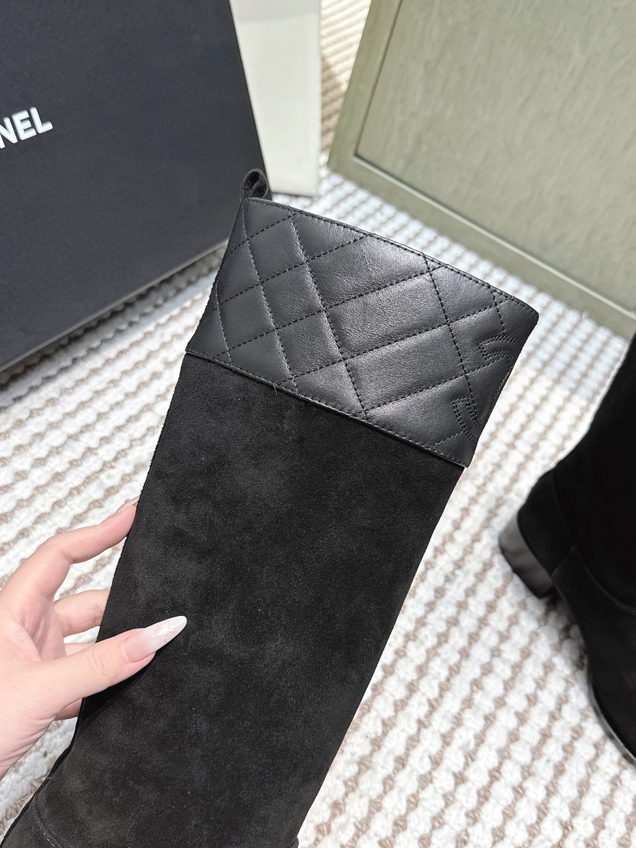 CHANEL 25S HIGH-CALF COWBOY BOOTS IN BLACK SUEDE AND CALFSKIN DIAMOND-QUILTED