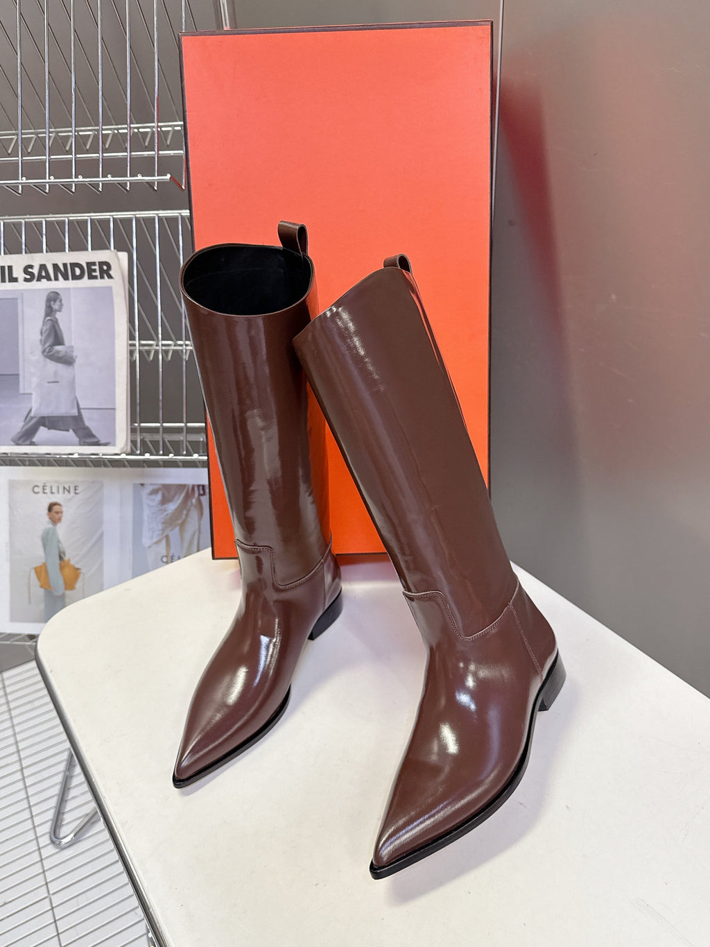 HERMES 25S POINTED-TOE KNEE-HIGH BOOTS IN BROWN GLOSSY LAMBSKIN
